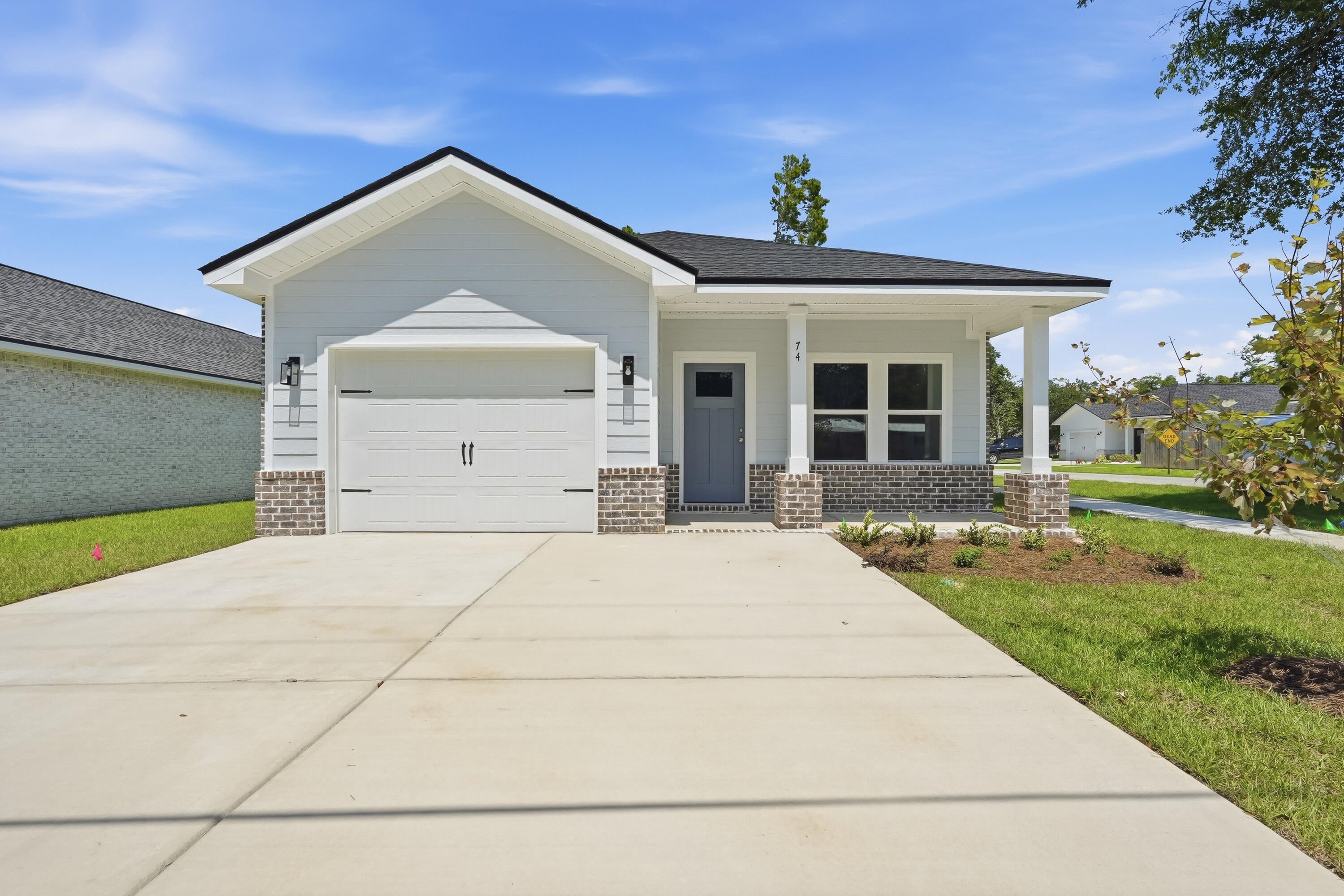 CONSTRUCTION COMPLERE!  CRAFTSMAN STYLE HOME  SCARLETT' plan has vinyl plank flooring throughout, quartz countertops, kitchen work island w/bar seating, walk-in pantry, owner's bath has walk-in closet, double vanities, linen storage, shower only.  Open family/dining/kitchen area + finished garage.  Front & rear porches for relaxing, privacy fenced yard is fully landscaped with sprinkler system.   Seller will contribute up to $12,000 towards buyers closing costs (call for details).