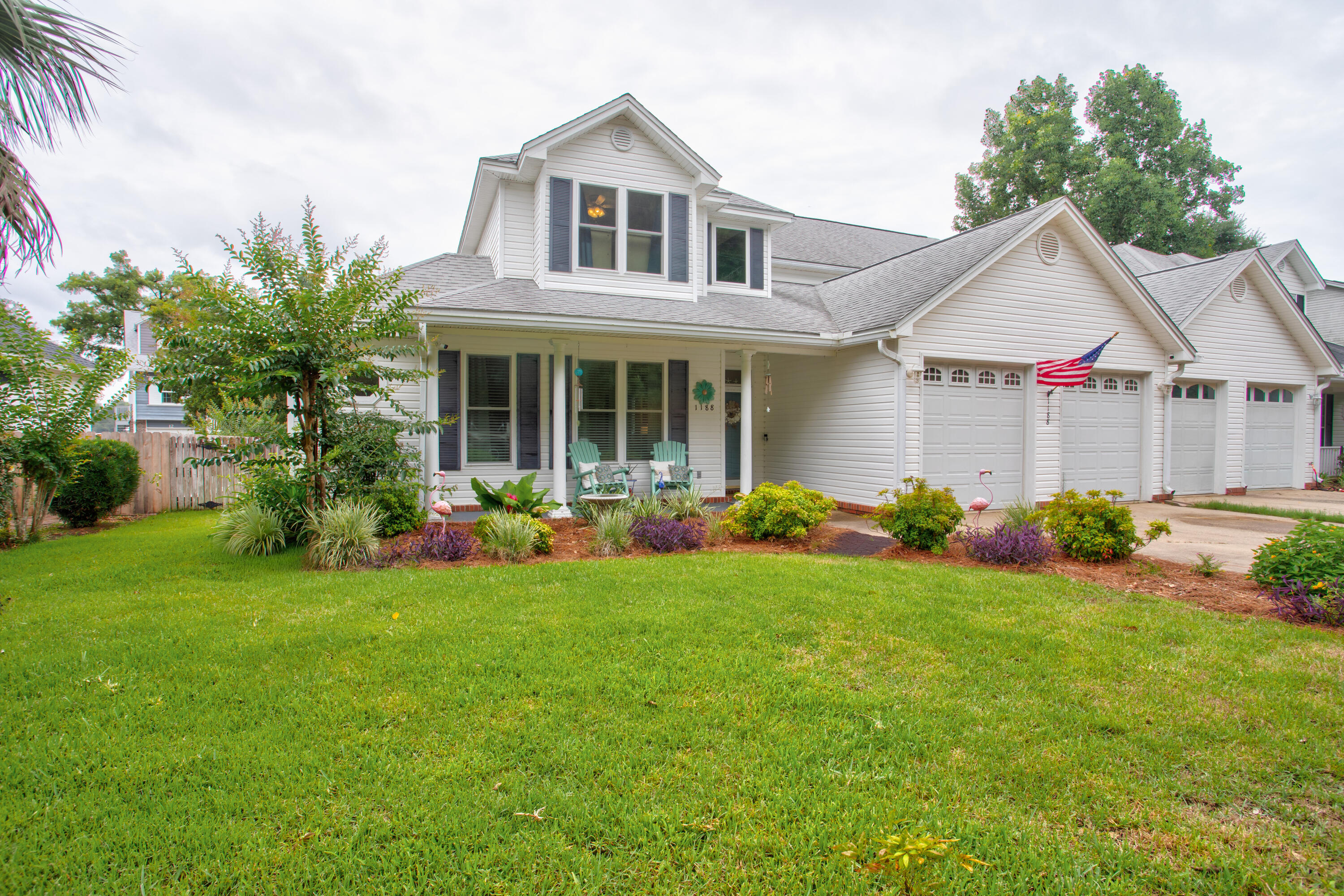 Experience the best of coastal living at 1188 N Bayshore Drive in Valparaiso. This custom-built Randy Wise home offers approximately 2,200 square feet of thoughtfully designed living space in the desirable Valparaiso Village area, conveniently located near waterfront recreation, parks, and local amenities.

Designed with both comfort and functionality in mind, this home features two spacious primary suites--one located on the main level and another on the second floor. The upstairs suite includes a private balcony, creating a peaceful space to enjoy coastal breezes and views of the surrounding area.

Step inside to an inviting open-concept floor plan where the living room, dining area, and kitchen flow seamlessly together, creating an ideal setting for both everyday living and entertaining. The well-appointed kitchen features upgraded stainless steel appliances, including a gas range, refrigerator, dishwasher, and microwave, along with rich wood cabinetry, beautiful onyx countertops, and durable tile flooring. The adjacent living area is anchored by a gas fireplace, adding warmth and character to the space.

Thoughtful updates and features provide added value and peace of mind, including a roof replaced in 2016, water heater installed in 2018, and HVAC system from 2013. The home is also equipped with dual Nest thermostats, hurricane impact windows, and a current termite bond.  Best of all, there is no HOA, allowing owners greater flexibility without additional association fees.

Large windows throughout the home fill the interior with natural light, enhancing the welcoming atmosphere and showcasing the home's spacious layout. Whether you're hosting guests, working remotely, or simply enjoying time at home, the flexible floor plan offers space to fit a variety of needs.

Located just a short distance from Lincoln Park Beach, the public boat launch, fishing pier, and waterfront recreation opportunities, this property provides convenient access to many of the outdoor activities that make the Emerald Coast lifestyle so appealing.

If you're looking for a well-crafted home with generous living spaces, quality finishes, valuable updates, and a location that embraces coastal living, 1188 N Bayshore Drive is a must-see.