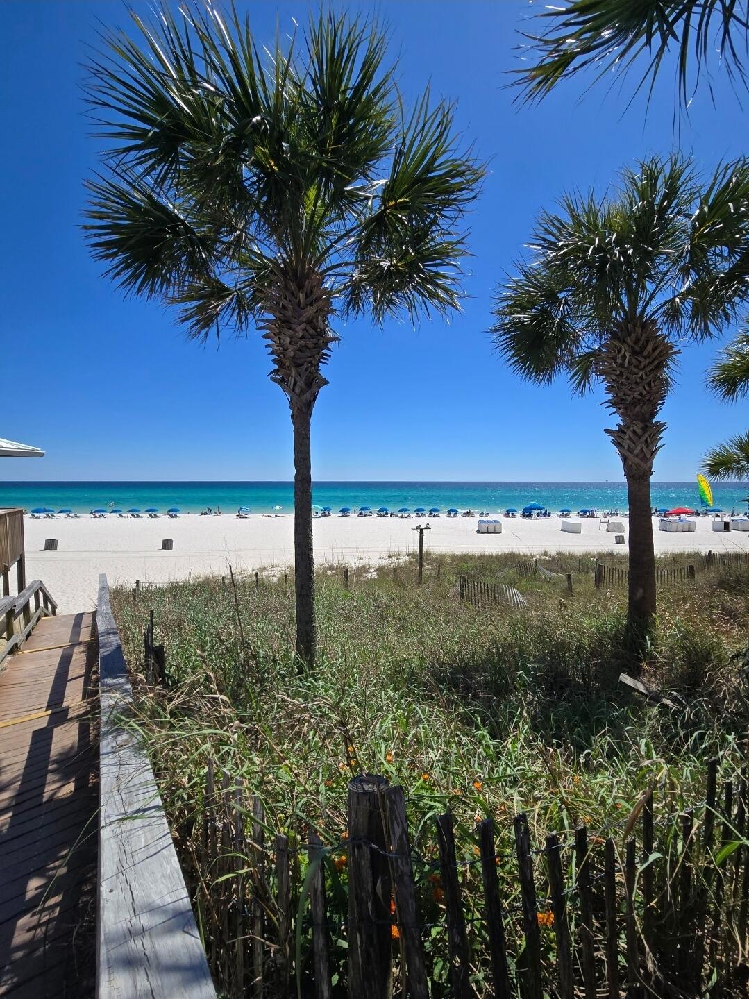 Excellent opportunity to own an affordable coastal getaway or income-producing investment property on the highly desirable west end of Panama City Beach. This charming 1-bedroom, 1-bath condo is conveniently located directly across the street from public beach access, offering quick and easy access to the sugar-white sands and emerald waters of the Gulf. Situated on the second floor, the unit features balcony views overlooking both community pools along with a peek of the Gulf from the kitchen window.

Ideally located only 1.5 miles from Pier Park, you'll enjoy close proximity to some of Panama City Beach's best dining, shopping, golf, fishing, entertainment, and outdoor activities. Whether you're searching for a vacation retreat, short-term rental investment, or affordable second home, this property offers excellent rental potential thanks to its prime location near the beach and popular local attractions.