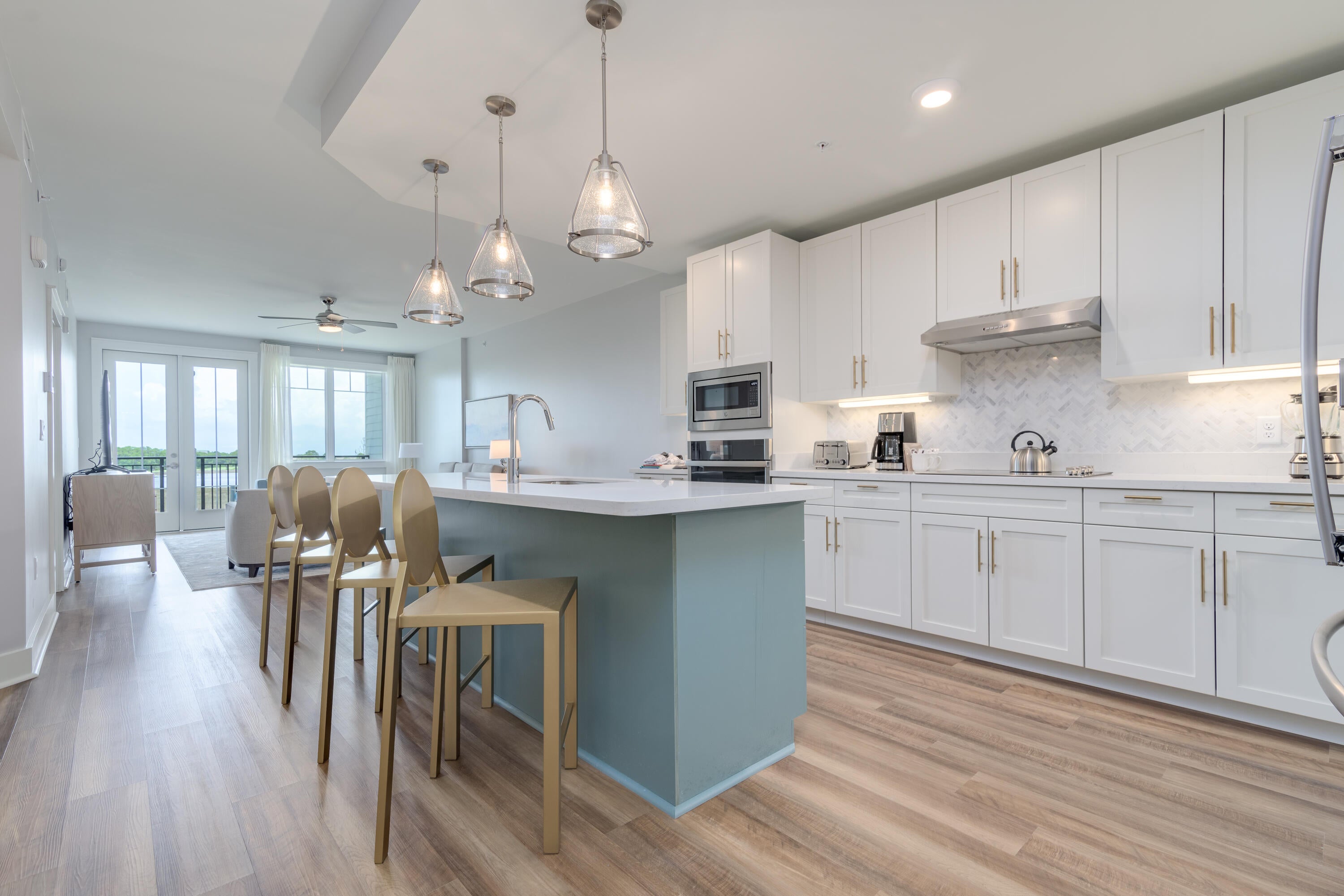 Thoughtfully designed for both comfort and functionality, the residences at Osprey Pointe blend timeless craftsmanship with modern coastal living. Open-concept floor plans feature custom cabinetry, detailed millwork, quartz countertops, GE Profile appliances, and 9-foot ceilings that enhance natural light and effortless flow. Each residence includes a private balcony overlooking serene natural surroundings, offering a peaceful connection to Sandestin's bayside landscape. Ownership at Osprey Pointe delivers a true resort-style lifestyle. Listing represents a specific floor plan available across multiple units. Finishes, views, and availability may vary. Residents enjoy a zero-entry pool, a 12-foot hydrotherapy spa, an on-site fitness center, and expansive landscaped lawn areas ideal for relaxation and gathering. Additional conveniences include assigned covered parking, optional golf cart parking with charging stations, and 24-hour on-site resort management for ease of ownership.

Located within Sandestin Golf and Beach Resort's Bayside community, Osprey Pointe is centrally positioned near The Village of Baytowne Wharf and offers convenient tunnel access to the private Gulf-front beach. Rental-friendly and professionally managed, the community is well suited for full-time residents, second-home owners, or buyers seeking both short- and long-term rental opportunities within one of Northwest Florida's most established resort destinations.

As an introduction to the Sandestin lifestyle, we invite our new owners to explore amenities that make Sandestin special. The listing brokerage and seller(s) are presenting the buyer(s) of this property with (2) 90-minute rounds of Tennis court time, a golf foursome at one of our three championship courses, and a round of golf for up to four (4) players at the unrivaled Burnt Pine Golf Club.

Sandestin Golf and Beach Resort features more than seven miles of beaches and pristine bay front, four championship golf courses, 15 world-class tennis courts, a 226-slip marina, a fitness center, spa and celebrity chef dining. Shop, dine and play at the charming pedestrian village, The Village of Baytowne Wharf and more. Inside the gates of the resort, residents enjoy a balanced lifestyle of high-class living, spanning the 2,400 acres from the beach to the bay. Everything within the gates of the resort is accessible by golf cart or bicycle. The entire resort is interconnected by miles of pedestrian, bike and golf cart paths that weave through groves of live oaks, meandering past natural lagoons, fountains, man-made lakes, and meticulously landscaped fairways.