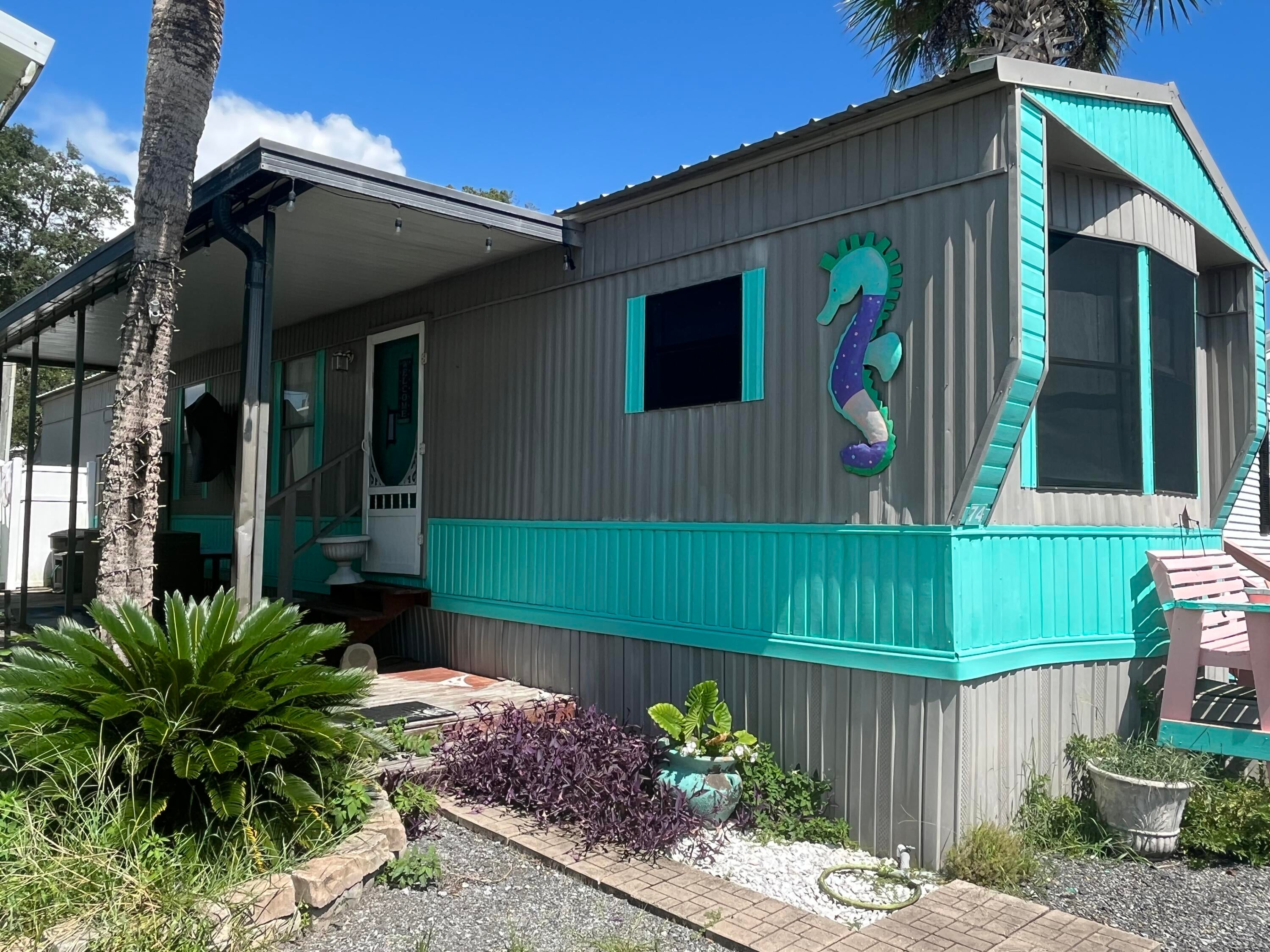 Just reduced!!! Won't last long at this price. Motivated seller! Bring an offer and start enjoying life close to the coast. Completely Renovated and well maintained less than 200 yards to the beautiful emeral beaches of Panama City Beach, this private getaway is just waiting for you! Located in the highly desirable Reid Court, enjoy the peace and quiet while still being walking distance to restaurants shopping and all the activites. 5 minutes drive to Pier Park, Top Golf and Dolly Parton's new pirate dinner. Inground pool, private beach access. Furnished w/ queen sleep number bed in primary. Twin daybed w/ trundle and sleeper sofa. Outside large covered patio w/ bar, tv and lots of entertaining space. Room for a hot tub. Storage sheds for beach gear and gren space for pets. Updated with corian countertops, new flooring, new hvac, new pex plumbing, new roof all within last 5 years.  Call today!