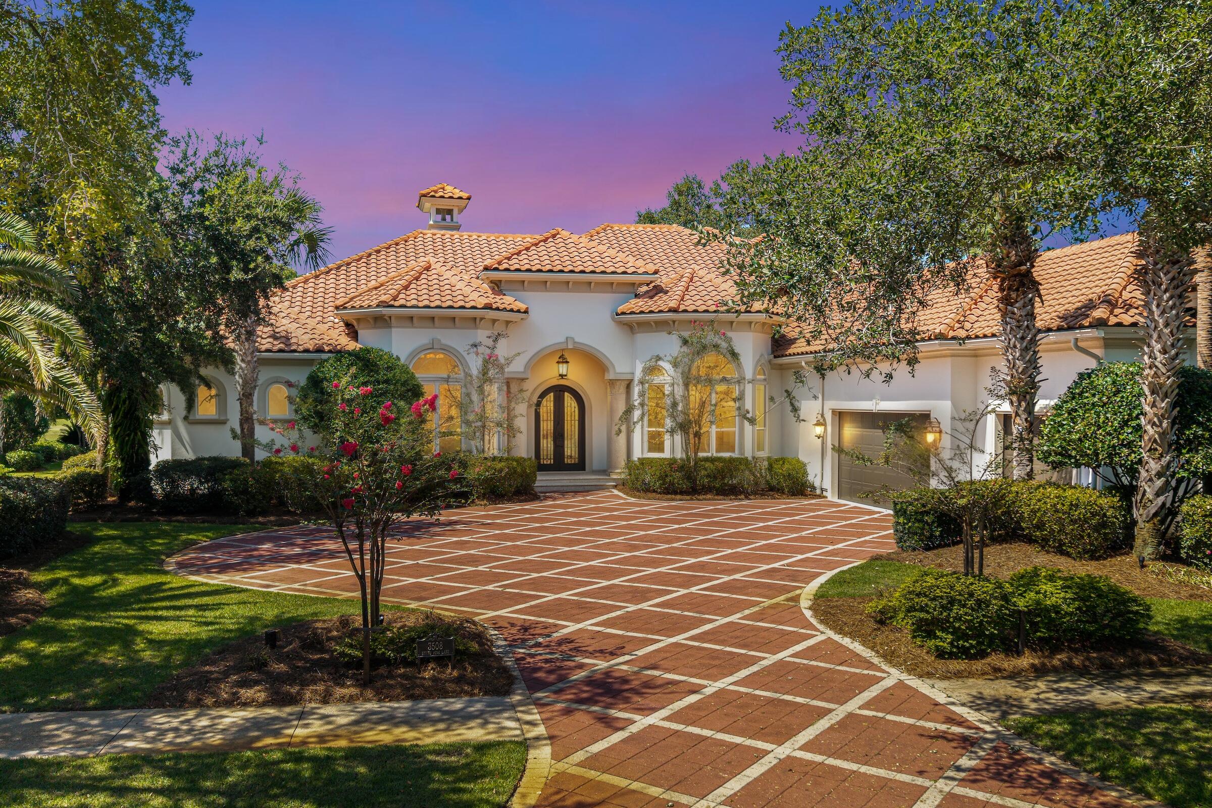 Welcome to this exceptional Boswell-built estate, beautifully positioned within Burnt Pine, the prestigious private community of Sandestin Golf & Beach Resort. Spanning 5,318 square feet and overlooking a serene lake along the 9th hole of the Raven Golf Course, this remarkable residence has undergone a complete renovation, blending timeless craftsmanship with sophisticated, modern coastal design. Thoughtful improvements are evident throughout, including newly sanded and refinished wood floors, fresh interior and exterior paint, new lighting, updated landscaping, and freshly painted office cabinetry. Every detail has been carefully considered to create a home that feels polished, refined, and truly move-in ready. At the heart of the home is a fully renovated chef's kitchen featuring custom cabinetry and an impressive collection of high-end appliances, including a Wolfe gas range, steam oven, Side by Side Sub-Zero refrigerator and Freezer, and two dishwashers. Designed equally for everyday living and entertaining, the home flows effortlessly to a spacious screened outdoor kitchen complete with a built-in Big Green Egg. One of the residence's most distinctive features is an Impressive wine cellar designed for the discerning collector. Outside, the completely redesigned pool area creates a private resort-style retreat. Bubblers, waterfalls, laminars, and an expansive hot tub with a spillover feature are surrounded by refreshed landscaping, creating an inviting backdrop for relaxing or entertaining while enjoying the beautiful lake and golf course setting. The spacious primary suite is equally impressive, featuring a beautifully remodeled bath with a steam shower, an updated fireplace, and glamorous custom built-in closet spaces. Additional features include HALO air purification technology within the HVAC system and numerous thoughtful upgrades throughout the residence. With its extensive renovation, exceptional outdoor living spaces, distinctive architectural details, and coveted Burnt Pine location, this home offers an extraordinary opportunity to enjoy the Sandestin lifestyle at its finest. Staged furnishings may also be purchased separately, offering the opportunity for a beautifully curated, nearly turnkey transition into this remarkable residence.

As an introduction to the Sandestin lifestyle, we invite our new owners to explore amenities that make Sandestin special. The listing brokerage and seller(s) are presenting the buyer(s) of this property with (2) 90-minute rounds of Tennis court time, a golf foursome at one of our three championship courses, and a round of golf for up to four (4) players at the unrivaled Burnt Pine Golf Club.

Sandestin Golf and Beach Resort features more than seven miles of beaches and pristine bay front, four championship golf courses, 15 world-class tennis courts, a 226-slip marina, a fitness center, spa and celebrity chef dining. Shop, dine and play at the charming pedestrian village, The Village of Baytowne Wharf and more. Inside the gates of the resort, residents enjoy a balanced lifestyle of high-class living, spanning the 2,400 acres from the beach to the bay. Everything within the gates of the resort is accessible by golf cart or bicycle. The entire resort is interconnected by miles of pedestrian, bike and golf cart paths that weave through groves of live oaks, meandering past natural lagoons, fountains, man-made lakes, and meticulously landscaped fairways.