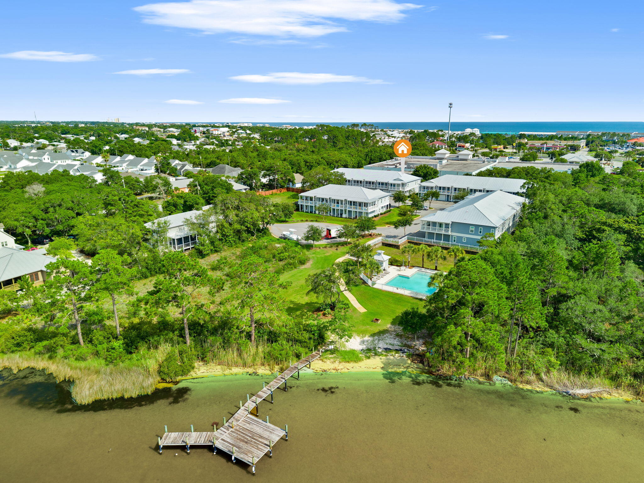 Spacious 4BR end-unit townhome in the peaceful waterfront community of Miller's Landing, offering the perfect blend of coastal living and value just minutes from 30A. Enjoy direct access to Lake Powell, one of Florida's rare coastal dune lakes, where boating, kayaking, paddleboarding, and fishing are just steps from your door.

Inside, you'll find 9-foot ceilings, quartz countertops, modern finishes, generous storage, and an open layout with plenty of room for family and guests. The private upstairs balcony provides the perfect spot to unwind after a day on the water.

Community amenities include a lakefront pool, private day dock, and shoreline for easy kayak and paddleboard launches. A public boat ramp just one block away offers convenient access for larger boats. Whether you're looking for a primary residence, second home, or investment property, Miller's Landing delivers an unbeatable waterfront lifestyle without the 30A price tag.

Owner open to a long term rental as well.