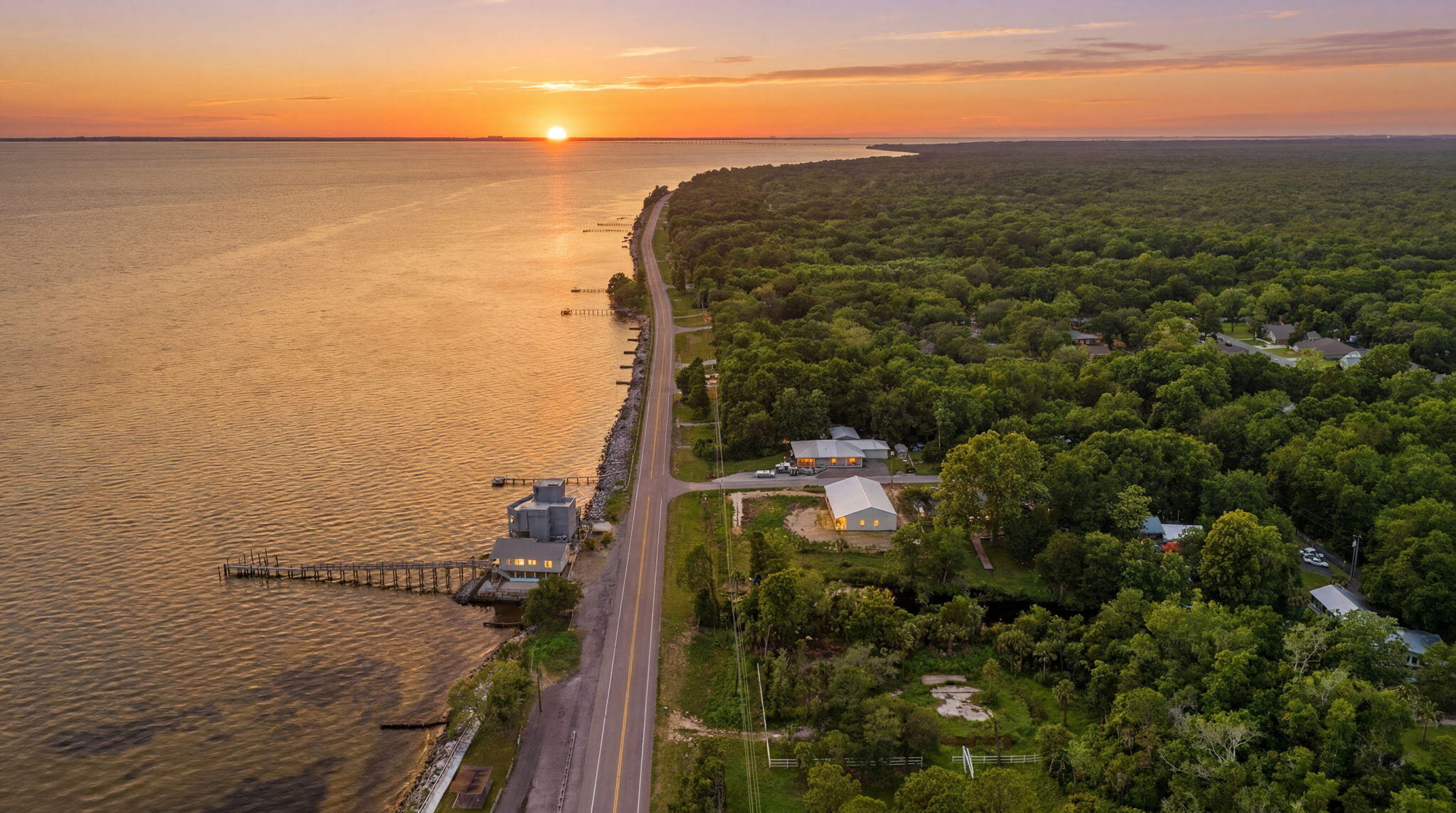 For buyers seeking that rare combination of scenic beauty and genuine peace, this expansive .53-acre parcel is truly one of a kind. Imagine waking to sunrises over the bay, enjoying afternoons sailing with the convenient boat launch across the street, and finally experiencing the calm you deserve. Whether you're envisioning a seasonal escape or your permanent sanctuary, this is the canvas you have been waiting for. The location strikes the perfect balance between serene natural surroundings and easy access to pristine beaches, waterfront dining, and vibrant community attractions, all without sacrificing that getaway feel. Create your ideal retreat with stunning waterfront vistas and seclusion. Bring your architect, bring your dreams, and make this elevated Florida lifestyle your own.