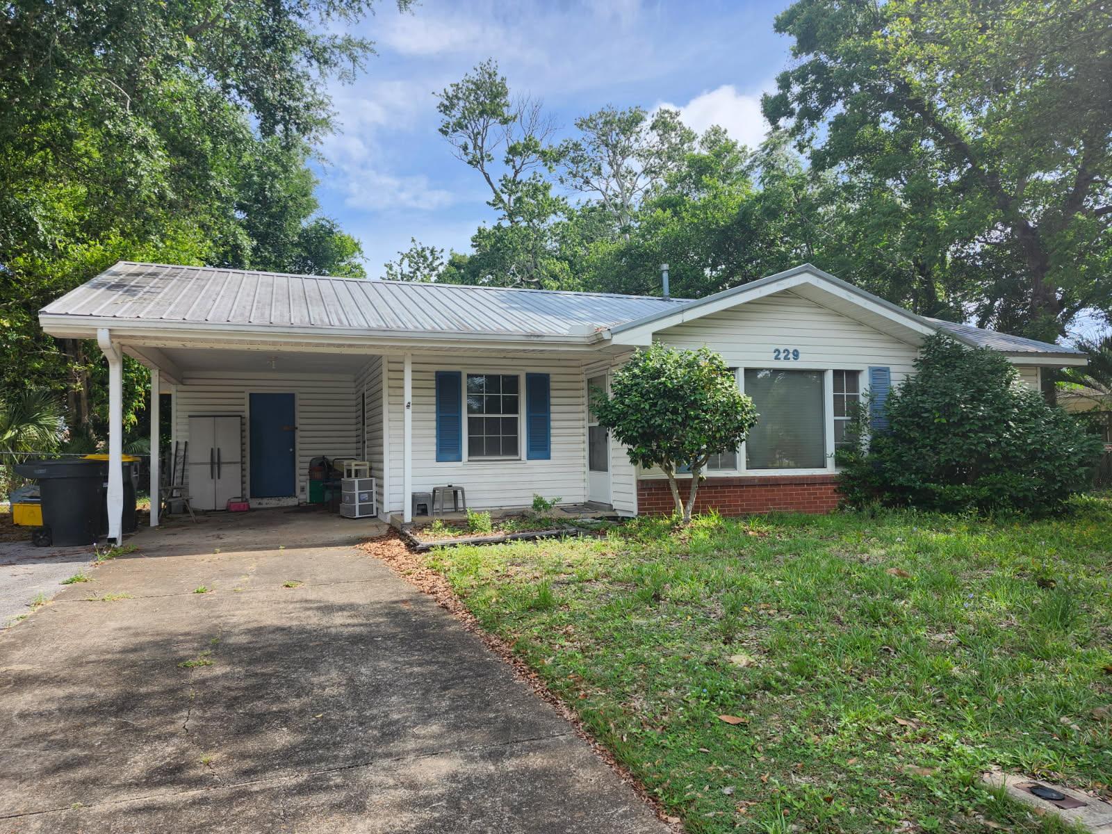 This 3-bedroom, 1-bathroom home features a strong foundation and highly durable metal roof. The core systems are in great shape, including a well-maintained HVAC system under 10 years old and a newer hot water heater. Inside, the floor plan spans 1,043 square feet and sits on a generous quarter-acre lot. The property offers solid bones overall but is ready for your personal touch. Bring your creative ideas, fresh paint, and cosmetic customization to truly make this coastal property shine!