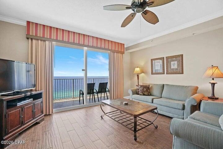Experience beachfront living at its finest in this beautifully maintained Gulf-front residence at Tidewater Beach Resort, one of Panama City Beach's most sought-after resort destinations. Designed for both personal enjoyment and strong vacation rental appeal, this spacious floor plan features an open-concept layout that maximizes natural light and showcases breathtaking views of the Gulf. One of the residence's standout features is the Gulf-front primary suite, allowing you to wake each morning to panoramic emerald water views and direct balcony access--a highly desirable floor plan rarely found in many beachfront condominiums. Hard surface flooring throughout provides a clean, low-maintenance interior that's ideal for coastal living and rental use alike. Offered in turnkey condition, this property is ready to enjoy from day one while eliminating many of the updates buyers often face. Tidewater Beach Resort remains one of Panama City Beach's premier Gulf-front communities, offering over 600 feet of sugar-white beachfront along with an exceptional collection of amenities including multiple outdoor pools, a heated indoor pool, Gulf-view fitness center, on-site movie theater, coffee bar, and an exclusive top-floor owner's lounge. Ideally situated on the desirable west end of Panama City Beach, you're just minutes from Pier Park's shopping, dining, and entertainment, providing the perfect combination of resort-style beachfront living and everyday convenience.