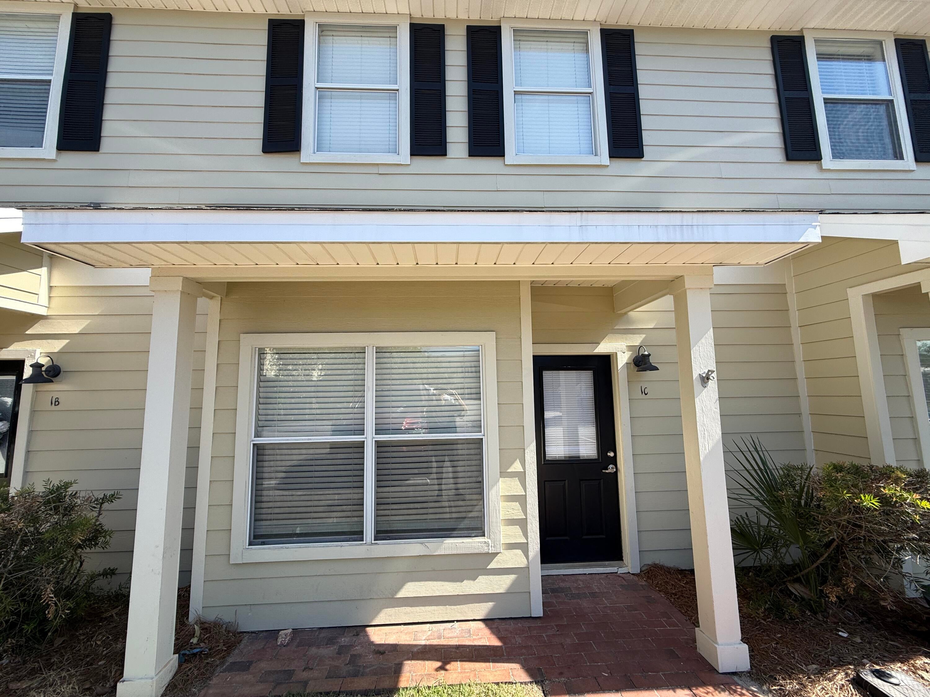 Welcome to this lovely 2 Bed/2.5 Bath with new paint and new flooring! It features beautiful granite countertops, solid wood custom cabinets, and stainless appliances. You'll love the 18-inch tile and stunning travertine counters in the bathrooms. The upgraded lighting package adds a nice touch, and the wooden decks at the back of each unit are perfect for relaxing. With large bedrooms, fresh paint, LVP flooring throughout, and a spacious floor plan, it's a wonderful place to call home.