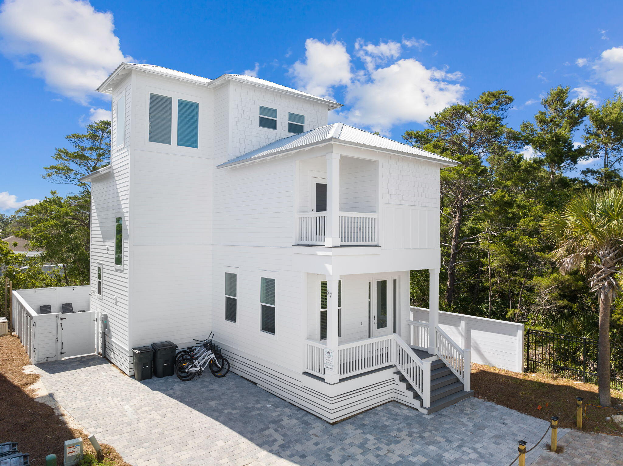 This fully furnished home is built to maximize rental income returns. Tucked away on a dead-end street with NO HOA DUES, you are just a short stroll away from the beach access and Gulf Place Town Center offering several restaurants and shopping venues. Three of the bedrooms offer their own private full bath. The main level of the home is geared around entertaining, with an open concept flowing from the living area through the kitchen, with access to the private pool area. There is a bonus space which includes custom built-in bunks, along with a half bath on the main level. On the second level, you will find the master and two guest rooms, each offering a private full bath. On the 3rd level you will find another large bonus area, which is configured for additional sleeping space.