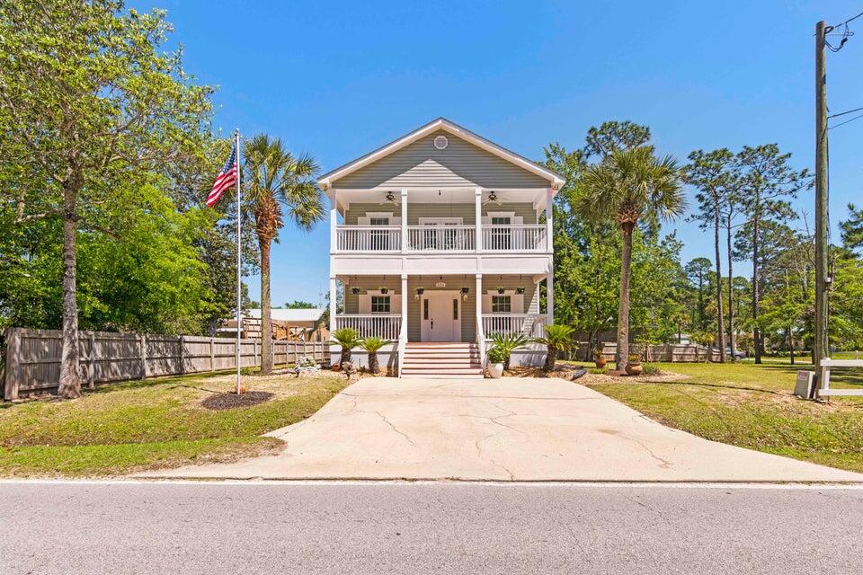 Welcome to 834 S Church Street -- a rare opportunity in the heart of Santa Rosa Beach offering space, flexibility, and endless potential. This beautifully maintained 3-bedroom, 2.5-bath home is centrally located less than 10 minutes from the Emerald Coast's white-sand beaches, dining, shopping, and entertainment.

The adjacent lot is also available for purchase under MLS #1002677. Purchase both the home and additional lot together for a combined price of $549,000, offering added flexibility for expansion, outdoor living, or additional parking/storage space.
