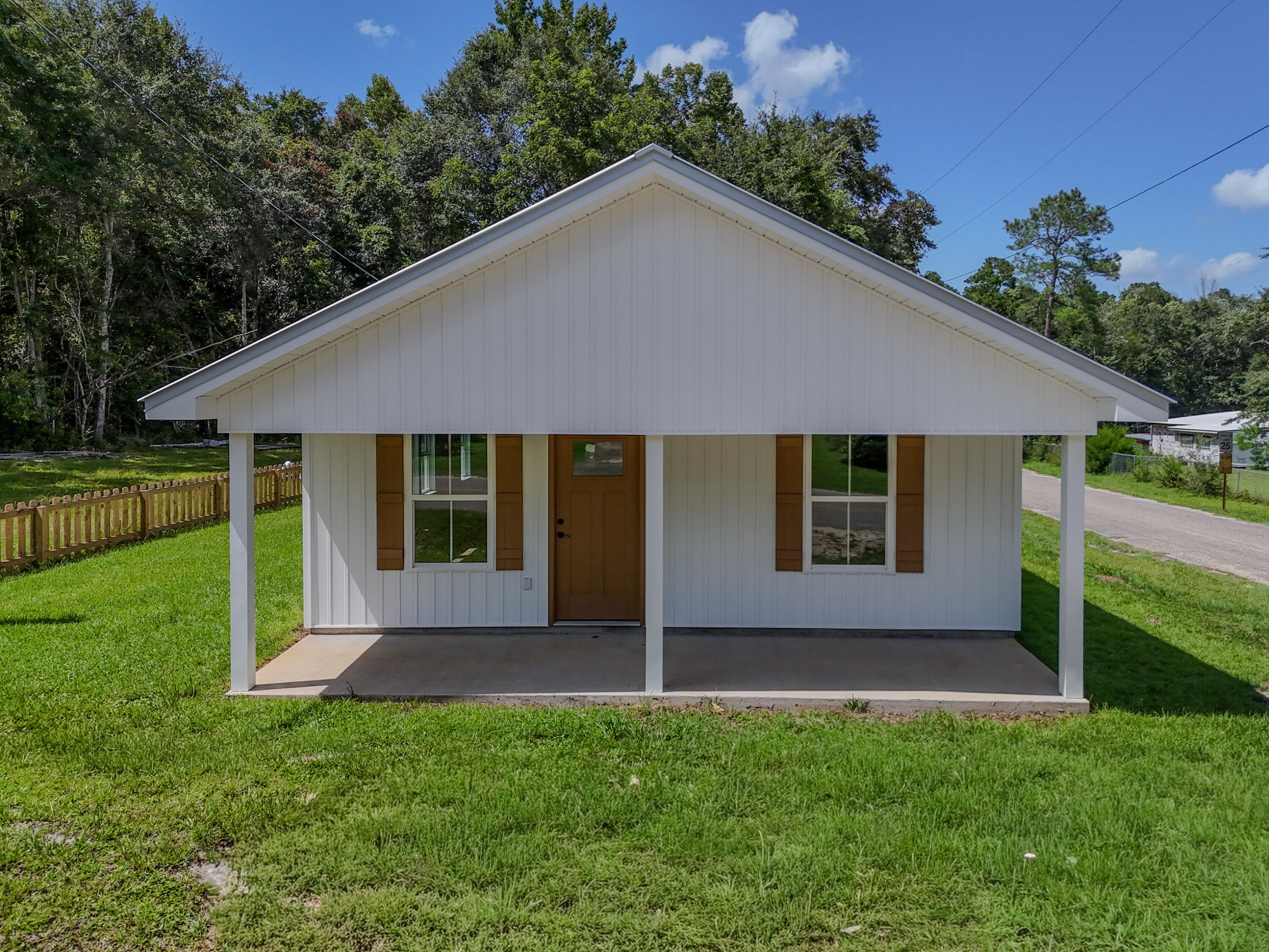 Tired of paying rent? HERE is a NEW house to call home!!! Located within the City of Florala, this great 3/2 home offers all laminate flooring, granite countertops, along with the appliances and a metal roof! Alabama allows you the opportunity to buy with lower insurance premiums and lower taxes! This home is low maintenance and has all the upgrades to include amazing white kitchen cabinets adding to the openness of the home. Home offers an open concept with living room, dining room, and kitchen all open perfect for entertaining. The laundry room located in the rear of the home also opens to the back yard, and deck, perfect for not tracking through your brand-new home!  Located on paved road! Home currently under construction. Pictures are of a previous house colors are subject to change.