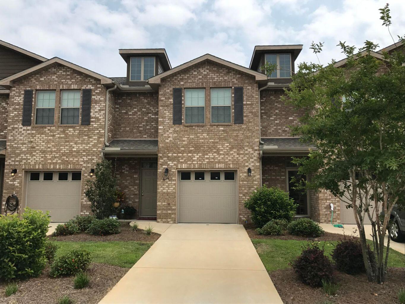This all brick 3 bedroom looks and feels brand new. The 2 story town home features 2.5 Bathrooms,attached garage, and tile throughout the first floor. The kitchen boast granite counters, maple cabinets and black GE appliances. Newer Wahser & Dryer included with rental. Highly desirable neighborhood with community pool and minutes away from the beach. No pets allowed. Call Today to apply!