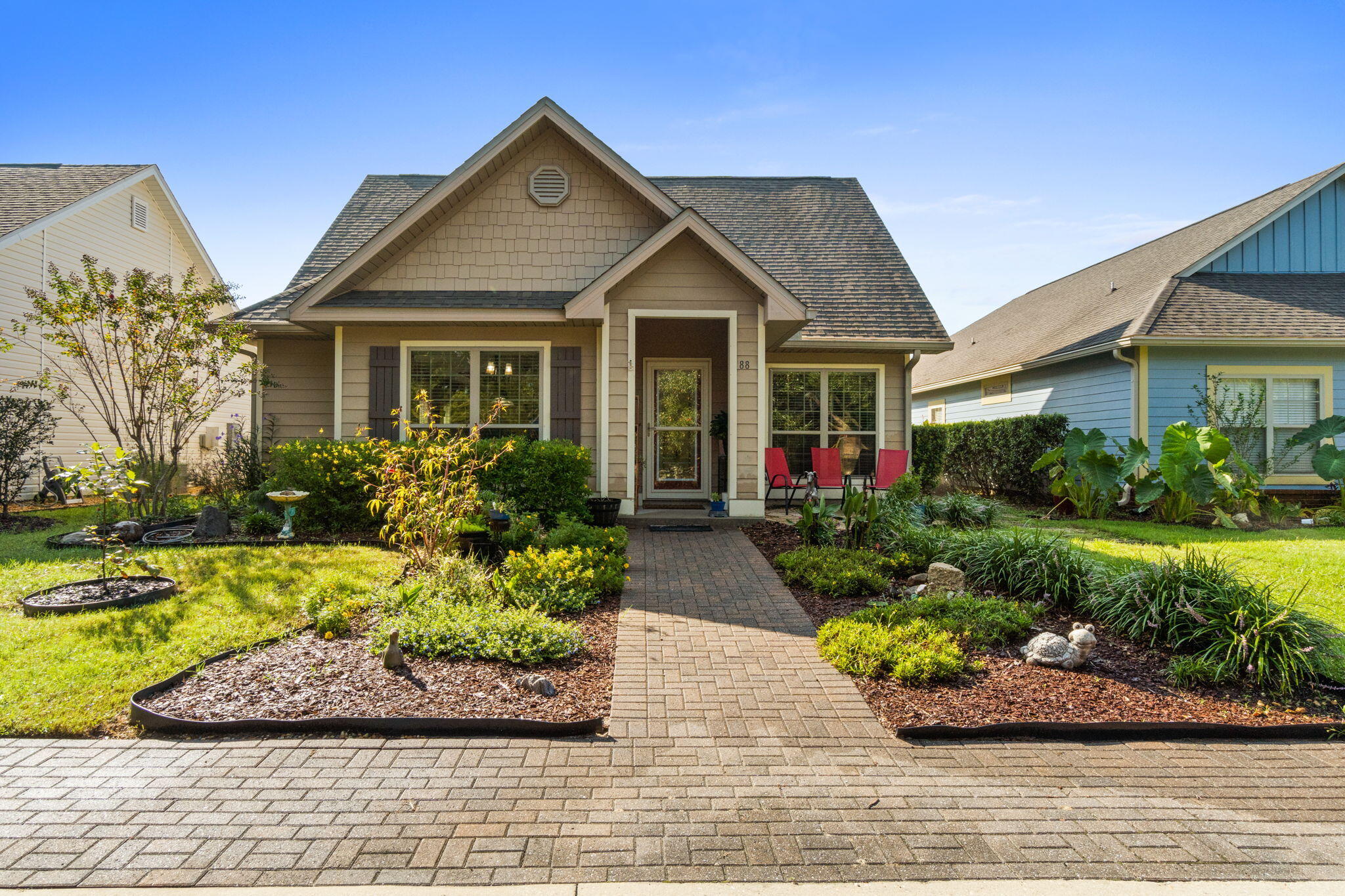 Nestled in the picturesque community of Schooner Landing in Hammock Bay, this Craftsman-style home showcases an efficient floor plan. 3 bedrooms, 2 bathrooms, w/ an open-concept split layout, this residence spans 1814 square feet of thoughtfully designed living space. Prominent features include: granite countertops w/tile backsplash , stainless steel appliances, gas cooktop, mbath w/tile shower, garden tub and double sink vanity, tile and laminate flooring and trey ceilings w/crown molding. The front views of the lake and
the front porch, adorned with a charming decorative door and upgraded landscaping provides an inviting welcome.  While at the rear entrance to the home an added patio awaits as the perfect spot to enjoy your morning coffee or evening sunset. Utilize the retractable screen for the garage space for even more entertaining space. Enjoy all of the amazing amenities Hammock Bay has to offer. Clubhouse, fitness ctr, pools, bayfront clubhouse, walking trails, sidewalks and more.