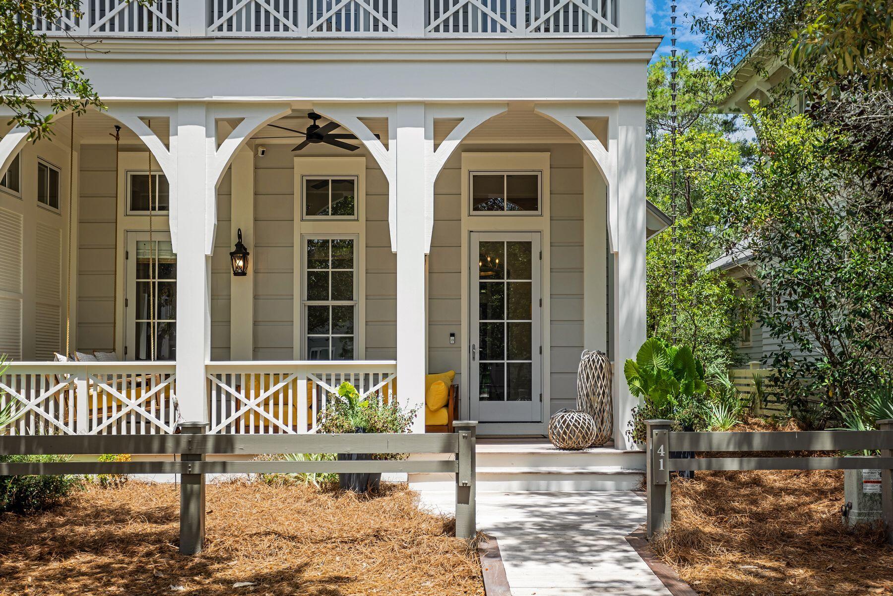 A rare opportunity to own a fully renovated WaterColor retreat that truly checks every box. Ideally situated in the highly sought-after Phase III of WaterColor, this exceptional residence offers six bedrooms--including a first-floor guest bedroom and a custom-built bunk room--a private carriage house, garage, resort-style pool, and an impressive collection of indoor and outdoor living spaces designed for both entertaining and everyday comfort. Recently transformed with a comprehensive renovation, the home showcases all-new designer furnishings, creating a completely turnkey experience. The chef's kitchen is equipped with premium Wolf and Sub-Zero appliances, while the adjoining living and dining areas flow effortlessly onto multiple covered porches that embrace WaterColor's signature indoor-outdoor lifestyle. Designed with hosting in mind, the screened outdoor entertaining area features a brand-new built-in barbecue, new countertops, ample gathering space, and an outdoor shower overlooking the private pool. Whether enjoying quiet mornings or entertaining family and friends, the home's thoughtful outdoor spaces offer exceptional privacy and functionality. Each bedroom features its own en-suite bathroom, providing comfort and privacy for owners and guests alike. In addition to the six bedrooms, the home also offers a second dedicated bunk room, a third-floor family room, a private theater room, and a large bonus room that can serve as additional storage, a hobby space, fitness room, or flex space to suit an owner's needs. From its extensive renovation and luxurious finishes to its versatile floor plan and premier WaterColor location, this is a rare turnkey opportunity to own one of the community's most complete and thoughtfully appointed homes.