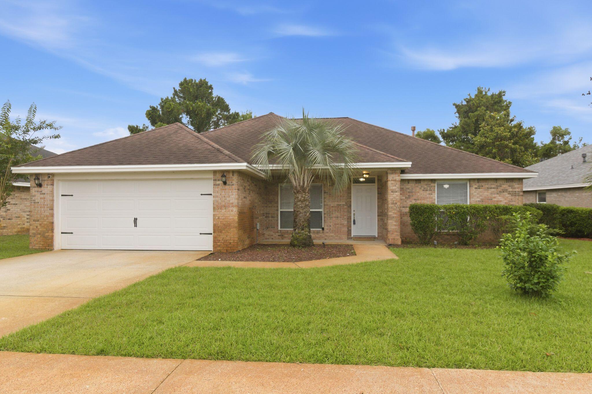 Lowest-priced home in Indian Lake AND a new roof with an acceptable offer! Add in a 2024 HVAC system, 2025 water heater, and a location that lets you travel from the Mid-Bay Bridge to the Destin Bridge without ever getting on Highway 98, and you've found one of the best values currently available in Destin.

Located in one of Destin's most convenient neighborhoods, you'll enjoy sidewalks, underground utilities, nearby shopping and dining, and the ability to ride your bicycle to the beach. Walmart, restaurants, and everyday conveniences are just minutes away.

Inside, this freshly painted 3-bedroom, 2-bath home offers a desirable split-bedroom floor plan, indoor laundry room, and a 2-car garage with an ultra-quiet garage door opener. The open living area features a gas fireplace and flows seamlessly into the dining and kitchen spaces. The kitchen is equipped with granite countertops, stainless steel appliances, a breakfast bar, breakfast nook, and formal dining area accented by architectural columns.

The primary suite provides a private retreat with a tray ceiling, walk-in closet with custom organizer, and a beautifully upgraded bathroom featuring a granite-topped double vanity and a custom tiled walk-in shower complete with dual shower heads and body jets.

Tile and luxury vinyl plank flooring run throughout the home--no carpet anywhere. Outside, enjoy a privacy-fenced backyard with a covered porch, storage building, newly sodded front yard, and a sprinkler  system with timer served by an irrigation well and lawn pump.

With major systems already updated, a roof replacement available with an acceptable offer, and an unbeatable central Destin location, this move-in ready home offers the perfect combination of value, convenience, and peace of mind.

Schedule an appointment with your favorite Realtor TODAY before this one is GONE!