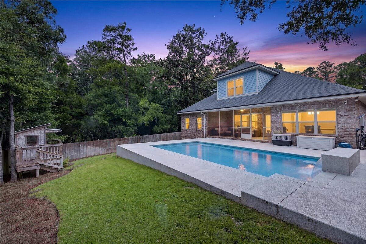 Built in 2018, this rare six-bedroom, three-bathroom home in Niceville offers plenty of space for a growing family, all on 1.4 private acres with no HOA.
The main level features an open-concept living area that flows into a beautifully updated kitchen with premium quartz countertops, making it perfect for both everyday living and entertaining. The primary suite is located downstairs along with three additional bedrooms and an attached two-car garage.
Upstairs, you'll find a spacious loft that's ideal as a playroom, media room, or homework space, plus two more bedrooms and a full bathroom.
Step outside to enjoy your own backyard retreat. The fully fenced property offers plenty of room to spread out, along with a screened patio and a beautiful saltwater pool that was added in 2023. Equipped with both a heater and a chiller, the pool can be enjoyed comfortably throughout the year, making it the perfect place to relax and take advantage of Florida's outdoor lifestyle.