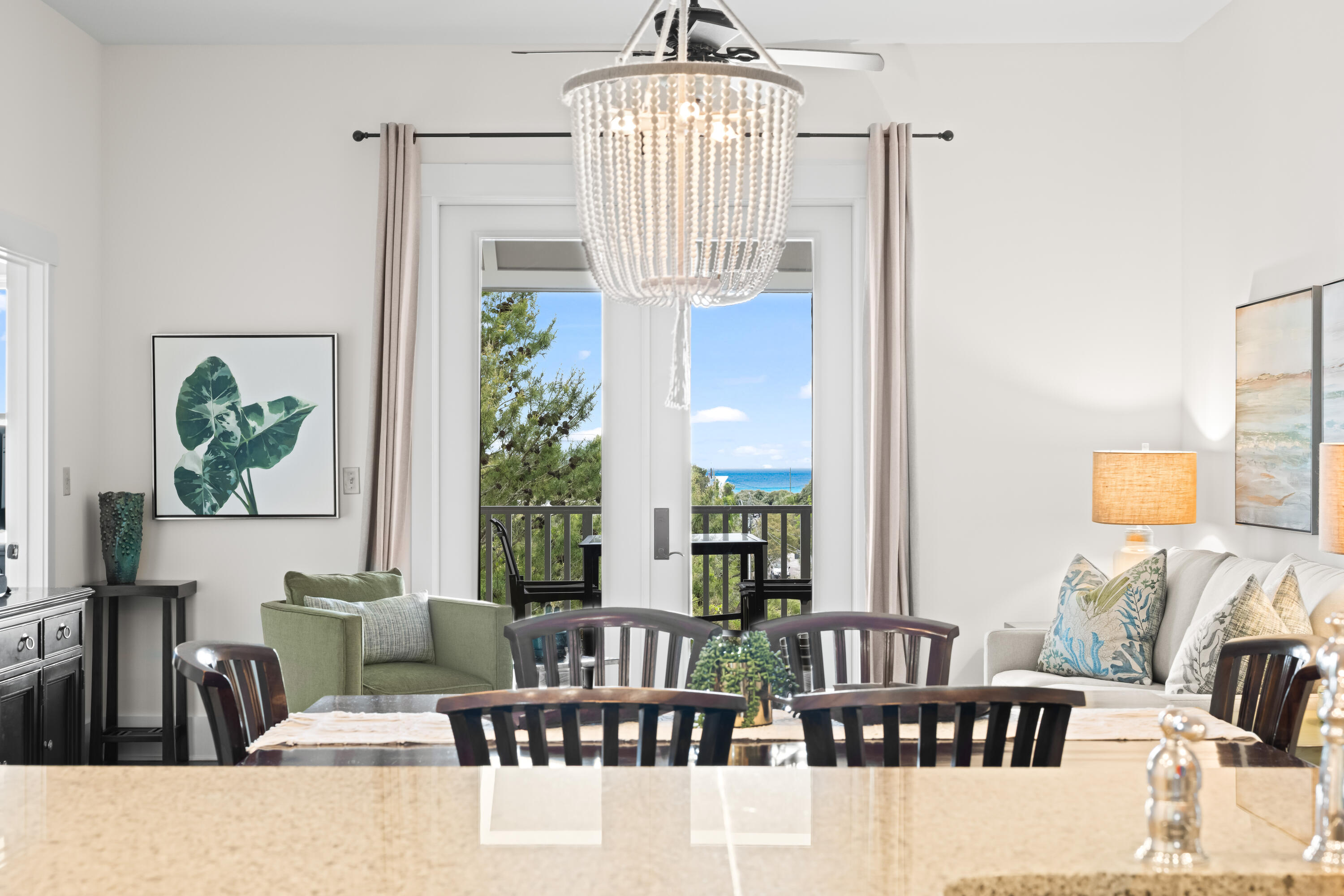 Top-floor M2 building condo with Gulf views in Redfish Village. This well-kept 2BR + hallway bunks floor plan offers an ideal layout for both personal use and rental flexibility. Enjoy a bright, open living space that flows onto a private balcony overlooking the treetops with a peek of the Gulf.
The kitchen features granite countertops, stainless appliances, and bar seating, opening seamlessly to the dining and living areas. The primary suite is spacious with a large bath, while the guest bedroom and built-in bunks provide comfortable accommodations for family and guests.
Never rented and meticulously maintained, this unit presents a rare opportunity for a true second-home feel in one of 30A's most sought-after communities.
Redfish Village amenities include private deeded beach access with with seasonal shuttle, resort-style pool, owner's lounge, and fitness room. All just a short walk to Blue Mountain Beach dining and shops.
