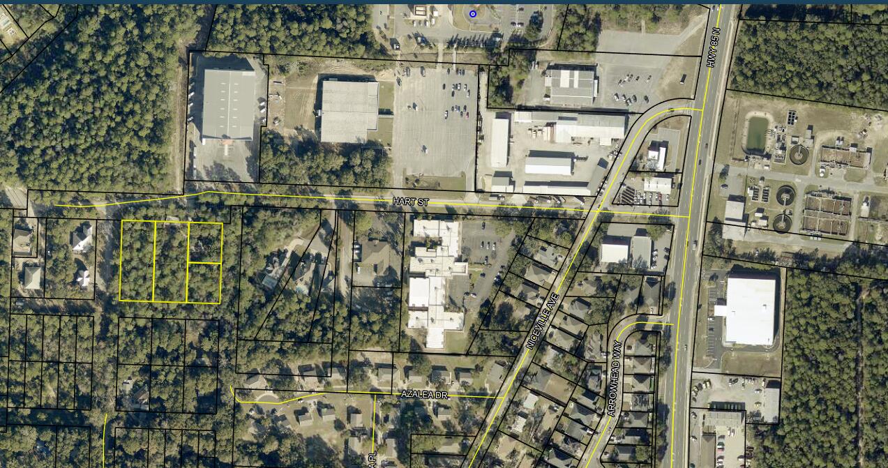 RARE 1.65-ACRE DEVELOPMENT OPPORTUNITY IN THE HEART OF NICEVILLE! Located within one of Northwest Florida's most desirable communities, this oversized parcel offers exceptional potential for builders, investors, developers, or buyers seeking acreage in a prime location. Zoned R1-B Single Family Residential (up to 8 dwelling units per acre), the property is surrounded by a mix of residential and higher-density zoning classifications, creating exciting possibilities for future development potential subject to buyer verification and approval by the City of Niceville.

Positioned just minutes from top-rated Niceville schools, shopping, dining, parks, boat launches, and the area's major military installations including Eglin Air Force Base and Hurlburt Field, this location continues to experience strong demand from both homeowners and investors. Niceville's strategic location near the Mid-Bay Bridge also provides convenient access to Destin, the beaches, and surrounding employment centers.

The property currently includes a 1,467-square-foot home that is being sold strictly AS-IS. The residence requires substantial repairs and renovations and is being given little to no value. The true value lies in the land, location, zoning, and future possibilities this unique parcel presents.

Opportunities to acquire 1.65 acres within the City of Niceville are increasingly rare. Whether you're looking to build, hold as an investment, or explore redevelopment opportunities, this property deserves your attention. Buyer to verify all zoning, land use, density, development potential, dimensions, utilities, and intended use during due diligence.