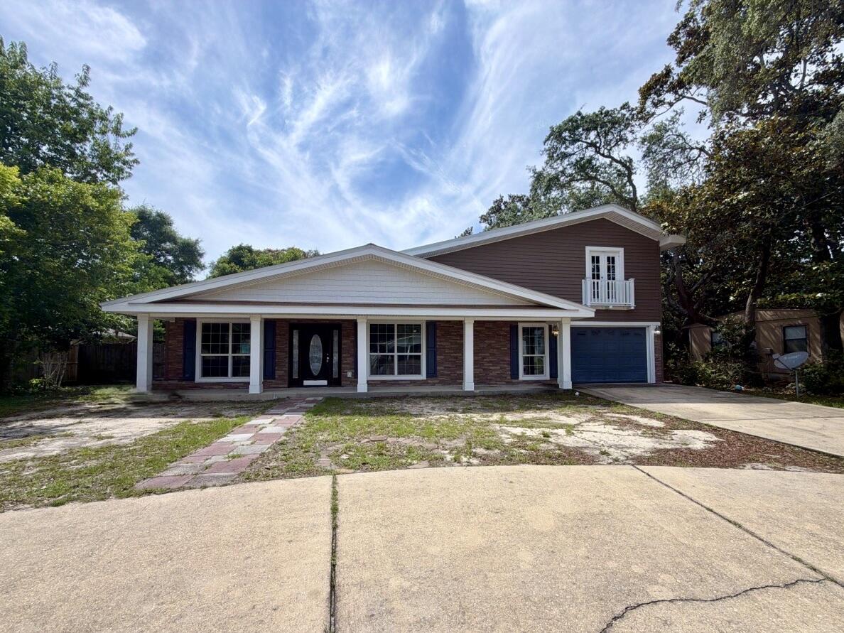 This centrally located, two-story REO property in Fort Walton Beach offers an incredible investment opportunity with tons of potential. Built in 1960, this spacious home features a rare layout boasting four bedrooms and 3.5 bathrooms, highlighting two complete master suites--one conveniently located downstairs and the other private on the second floor. The functional floor plan includes an oversized one-car garage and a fully fenced backyard that centers around an in-ground gunite pool. Positioned in the heart of town, the property is  just a few miles from both Eglin AFB and Hurlburt Field. The beaches, shopping, schools and more are also just a short drive away. Because the home does require some repairs, it may not qualify for traditional financing, making it a perfect fit for renovation loans, cash buyers, or investors. This property may qualify for vendee financing and is a definite must see. Call today!