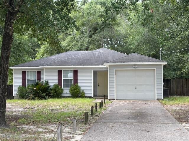Available for immediate occupancy, this elegant 3-bedroom, 2-bath residence offers a balanced combination of comfort, privacy, and convenience. Located on a generous lot in Crestview, the property features a fully fenced backyard, providing substantial outdoor space just moments away from Duke Field, 7th Special Forces Group, and I-10, while remaining conveniently situated near Crestview's shopping amenities. The interior boasts a thoughtfully constructed layout, including a spacious primary suite, and a large living room characterized by soaring vaulted ceilings. The galley-style kitchen is equipped with ample cabinet and counter space, a sizable walk-in pantry, and flows seamlessly into the dining area, which is enhanced by a bay window with views of the expansive fenced backyard. Transitioning from the dining area, the open patio is ideal for grilling, entertaining, or enjoying morning coffee. A one-car garage offers additional storage and convenience. For those in search of a property with substantial outdoor space, a functional floor plan, and a desirable location in South Crestview, this residence warrants serious consideration!