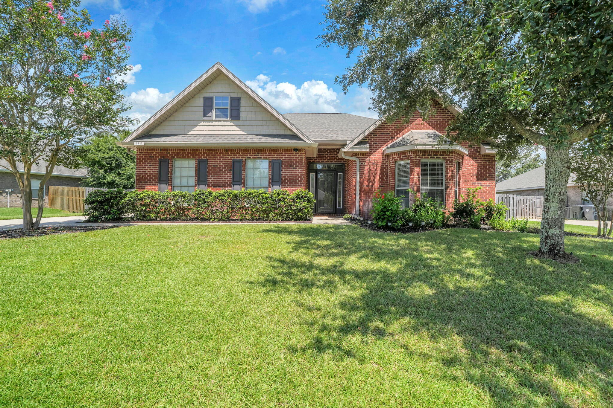 Can you picture yourself here? 163 Camellia Court is a beautifully maintained 3-bedroom, 2-bath, 1,901-square-foot home in the Gardens at Hammock Bay with no rear neighbors, a peaceful pond backdrop, and an outdoor living space made for enjoying Florida year-round. Inside, vaulted ceilings and abundant natural light create a bright, open feel. The kitchen features white cabinetry, granite countertops, stainless steel appliances, a pantry, and breakfast bar overlooking the living room. Bamboo flooring runs through the living areas and bedrooms--no carpet here--and the split floor plan gives the spacious primary suite comfortable separation from the guest bedrooms. The primary suite includes a tray ceiling, walk-in closet, dual vanities, garden tub, and separate shower.
The Florida room may become your favorite spot in the house. With a wall of windows overlooking the backyard and pond, it's perfect for morning coffee, a second sitting area, home office, or hobby space.
Outside is where this home really stands apart. A large paver patio and covered pergola create plenty of room for grilling, dining, and gathering with friends. The fenced backyard offers green space, established landscaping, and no home directly behind you--just the catch-and-release pond beyond the fence. A sprinkler system with lawn pump and landscape lighting help keep the outdoor spaces looking their best. Additional features include a brand-new water heater and side-entry garage with ample off-street lawn pump and landscape lighting add to the thoughtfully maintained outdoor space.
Additional features include a brand-new water heater and side-entry garage with ample off-street parking.
Living in Hammock Bay means enjoying resort-style pools, fitness facilities, pickleball and tennis courts, miles of walking and biking trails, dog parks, playgrounds, fishing opportunities, the General Store, Props Brewery, community events, and the Freeport Regional Sports Complex, with shopping, dining, and the beaches of South Walton within easy reach.
Move-in ready, beautifully maintained, and offering the indoor and outdoor spaces that make Florida living so enjoyable--come see what makes 163 Camellia Court worth a closer look.