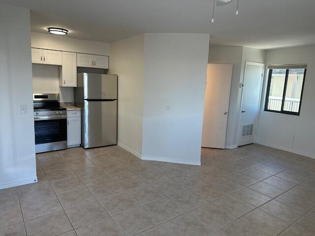 Discover one of the best values in Panama City Beach, an studio condo located less than 150 steps from the sugar white sand, and it is priced under $150K! Located in Sand Castle Villas, this unfurnished unit is a blank canvas ready for your personal design and furnishing vision. The kitchen has been thoughtfully updated with brand-new stainless steel appliances and new cabinetry, offering a fresh, modern feel. Tile flooring runs throughout for durability and easy maintenance, ideal for beach living or rental use. A standout feature of this unit is the Gulf view right outside your front door, step outside and take in the sights and sounds of the emerald waters just moments away. The beach is less than a one-minute walk (approximately 150 steps) via Beach Access 13 and 14, making this an unbeatable location for convenience and coastal lifestyle. Additional highlights include: • Private fenced pool and outdoor shower • Private laundry room just outside the unit with washer, dryer, and extra storage • One assigned parking space plus overflow parking • Balcony space to relax and enjoy the coastal breeze • Quiet, smaller complex with a laid-back, personable atmosphere • Close proximity to restaurants, shopping, and just a short drive to Pier Park Whether you're seeking an affordable beach getaway, an income-producing property, or both, this updated studio offers exceptional value, location, and upside in today's market.