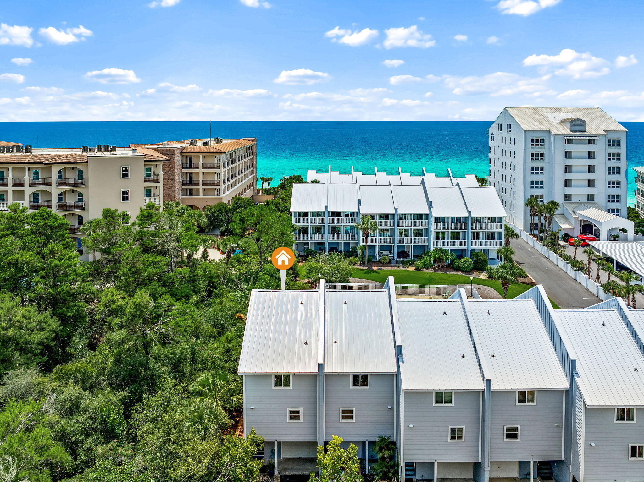 Wake up to Gulf breezes and the sound of the surf from your own private balcony -- this end-unit townhome in Sea Bluff, a low-density beachfront enclave south of 30A in Blue Mountain Beach, FL, is the kind of find that doesn't come around often.

Fully furnished and truly turnkey, this 2-bedroom, 2.5-bath condo is ready for you to move in as your primary home, your beach escape, or a vacation rental. And here's the rare part: a private one-car garage -- a genuine luxury on 30A -- plus a spacious, climate-controlled laundry room right on the ground floor.

Upstairs, the main living level is made for gathering, with an updated kitchen and open-concept living area flowing out to the balcony. The third floor is your retreat: a primary suite with a king bed and en-suite bath, plus a second bedroom with a queen and twin bunks, perfect for family or guests, along with a second full bathroom. Every floor has its own balcony overlooking the community pool -- coffee at sunrise, cocktails at sunset, and the opportunity to slow down and embrace the 30A lifestyle.

Step outside and you're steps from Urban Market, Cowgirl Kitchen, McTighes, For the Health of It, and Blue Mountain Bakery, with Blue Mountain Creamery and Red Fish Village just beyond.

This prime location is also:
2 miles to Gulf Place
3 miles to Old Grayton Beach
4.5 miles to Seaside

This is coastal living the way it's meant to feel. Come see it before someone else calls it home.