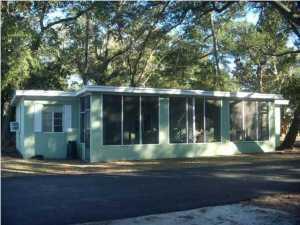 Cozy Cottage located 2 blocks east of Mary Esther Blvd.  New refrigerator. Screened in front porch for relaxing, Security deposit includes nonrefundable carpet cleaning and pest control. Water and sewer are included in the rent. NO PETS ALLOWED NO WATER ACCESS.