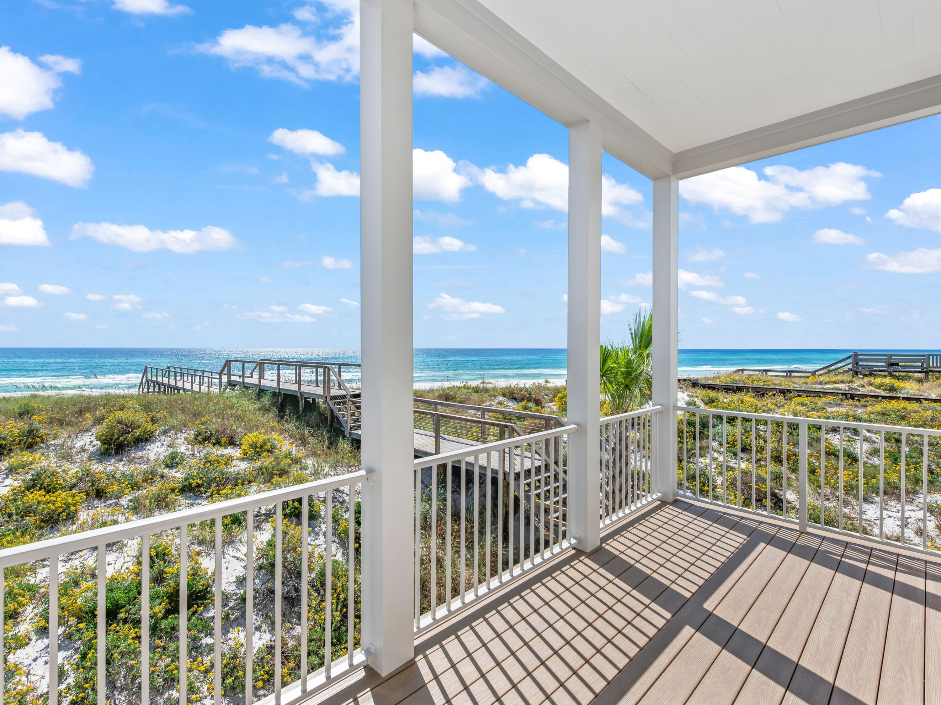 Located within the intimate, architecturally curated enclave of Lupin Beach in Inlet Beach, Lot 3 offers a rare blend of new Gulf-front construction, refined coastal design, and exceptional value along the coveted eastern end of Scenic 30A. Positioned as the second-most western Gulf-front residence in this boutique community, the home delivers a highly desirable layout that lives comfortably while maximizing Gulf orientation and natural light.

This three-bedroom, three-and-two-half-bath residence spans 2,300 square feet, introduced by a calming neutral exterior palette that embodies timeless coastal elegance. Inside, gold and brass-toned fixtures, premium appliances, and elevated material selections shape an atmosphere of warm sophistication. The thoughtful floor plan balances openness with functionality, creating an effortless flow through beautifully composed interior spaces.

Outdoor living is expressed through a series of architectural moments that celebrate the Gulf's presence. The top-floor covered balcony provides generous seating space, steady breezes, and an intimate vantage point over the water--ideal for morning rituals or evening unwinding. Additional Juliette balconies on the southern and western elevations welcome abundant natural light and capture charming view corridors toward the shoreline and sunset.

Adjacent to the two-car garage, a covered transitional space features a built-in kitchenette designed for practical everyday use--perfect for preparing refreshments, or supporting coastal living with ease--without serving as a full summer kitchen.

Beyond the residence, the home's location on the eastern edge of Inlet Beach offers unmatched access to both protected natural beauty and the celebrated destinations of the 30A corridor. Steps away, Lake Powell, one of Florida's largest coastal dune lakes, provides opportunities for paddle boarding, kayaking, fishing, and serene exploration. Immediately to the east, Camp Helen State Park offers hiking trails, a fishing pier, wildlife viewing, and seasonal community programming within a preserved natural setting.

Within minutes, owners can enjoy the world-class boutiques, dining, and cultural events of Rosemary Beach, Alys Beach, Seacrest Beach, and the emerging offerings at Kaiya Beach Resort. Premier club and recreation options are also close by, including Watersound Beach Club, the expansive new amenities at Camp Creek, and Wild Heron Golf Club with its marina, restaurant, fitness facilities, and outdoor activities.

Travel convenience is another hallmark of this location, with Northwest Florida Beaches International Airport (ECP) just 15-20 minutes away, offering direct flights to major markets such as Atlanta, Dallas, Nashville, Charlotte, Miami, and New York.

Now fully completed and ready for immediate occupancy, Lot 3 stands as one of the most compelling Gulf-front opportunities on eastern 30A--blending thoughtful design, intimate community living, and the rare privacy that defines Lupin Beach.