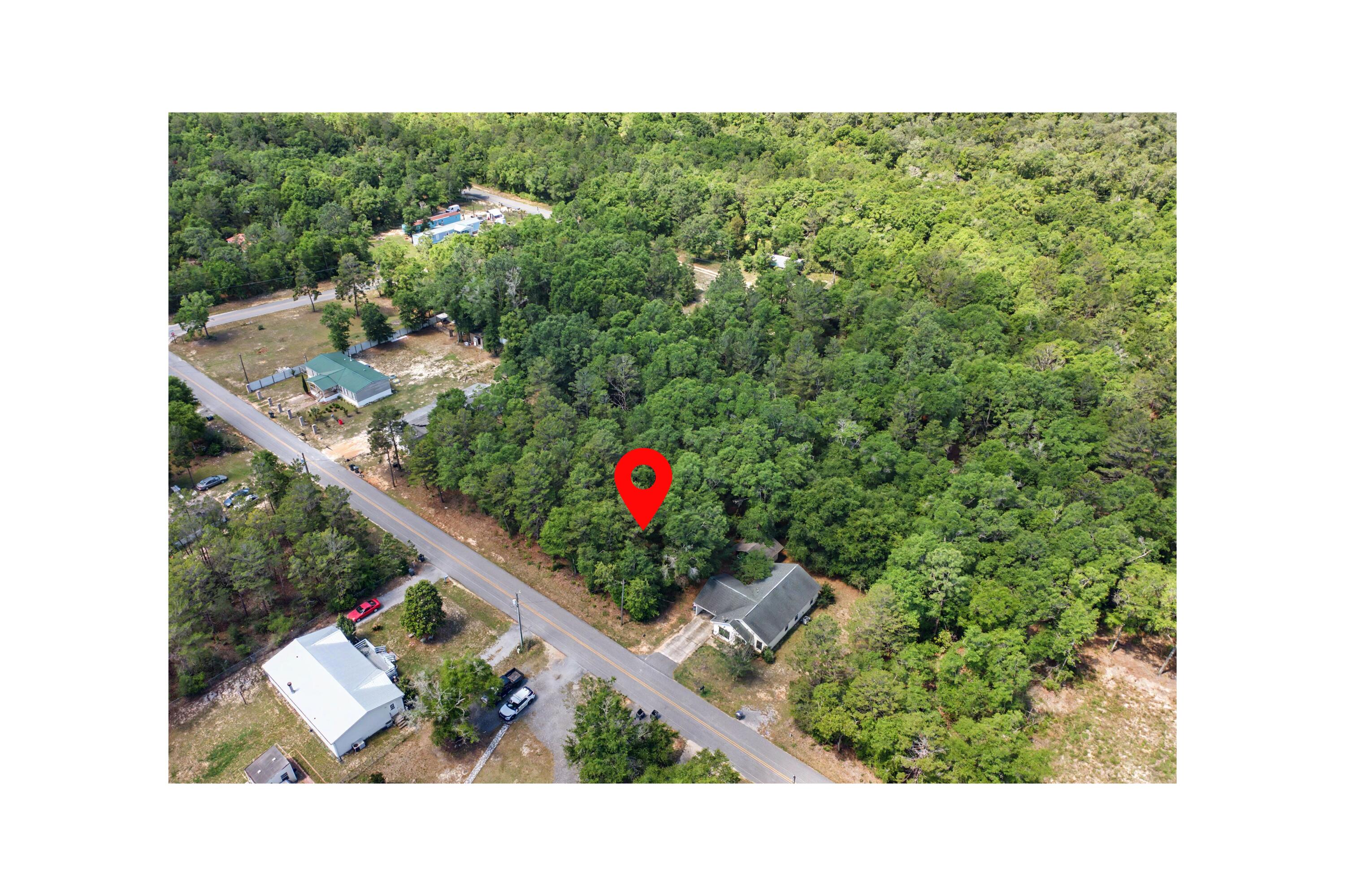Build your dream home or next investment project on this beautiful wooded lot located on Picasso Circle in DeFuniak Springs! Tucked away in a quiet setting, this property offers a natural landscape with mature trees, providing privacy and flexibility for your future plans. With easy access to major roadways, commuting to nearby communities and the Emerald Coast is simple.
Whether you're a builder looking for your next spec home opportunity or a buyer ready to create a custom home, this vacant lot offers excellent potential in a growing area of Walton County.