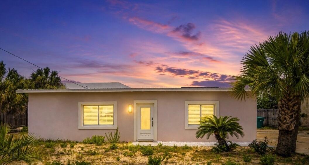 Multiple Offers.  Highest and Best due by12pm on 07/25/26.  Welcome to your coastal retreat on beautiful Okaloosa Island. Ideally located just 150 yards from the sugar-white sands and emerald waters of the Gulf, this beautifully renovated beachside home offers the perfect blend of coastal living, modern comfort, and investment potential. Enjoy easy access to Downtown Fort Walton Beach, Destin, waterfront dining, shopping, entertainment, boating, and some of the Emerald Coast's most sought-after beaches. Inside, you'll find a bright and inviting open-concept floor plan designed for effortless living and entertaining. Thoughtfully updated throughout, the home features oversized tile flooring, recessed lighting, custom plantation shutters, quartzite and luxury stylish finishes that create a fresh, relaxed atmosphere. The updated kitchen serves as the heart of the home, showcasing stainless steel appliances, sleek cabinetry, a classic subway tile backsplash, and an oversized island perfect for gathering with family and friends after a day at the beach. Spacious living areas provide plenty of room to relax and entertain, while the well-appointed bedrooms offer comfortable retreats filled with natural light. Every detail has been carefully considered to create a move-in-ready coastal escape. Step outside and embrace the island lifestyle. Spend your days walking to the beach, paddleboarding, fishing, boating, dining at local seafood restaurants, or  simply enjoying breathtaking Gulf Coast sunsets. The generous lot provides abundant space for outdoor entertaining, future landscaping enhancements, additional parking, or boat and RV storage.
With two bedrooms and exceptional versatility, this property is ideal as a primary residence, second home, or income-producing long-term rental. Its prime location near the beach, combined with extensive renovations and flexible outdoor space, creates lasting value and broad appeal.
Opportunities to own this close to the beach are increasingly rare. Experience the charm, convenience, and relaxed coastal lifestyle that make Okaloosa Island one of Northwest Florida's most desirable destinations.
Please note: Short-term rentals are not permitted.