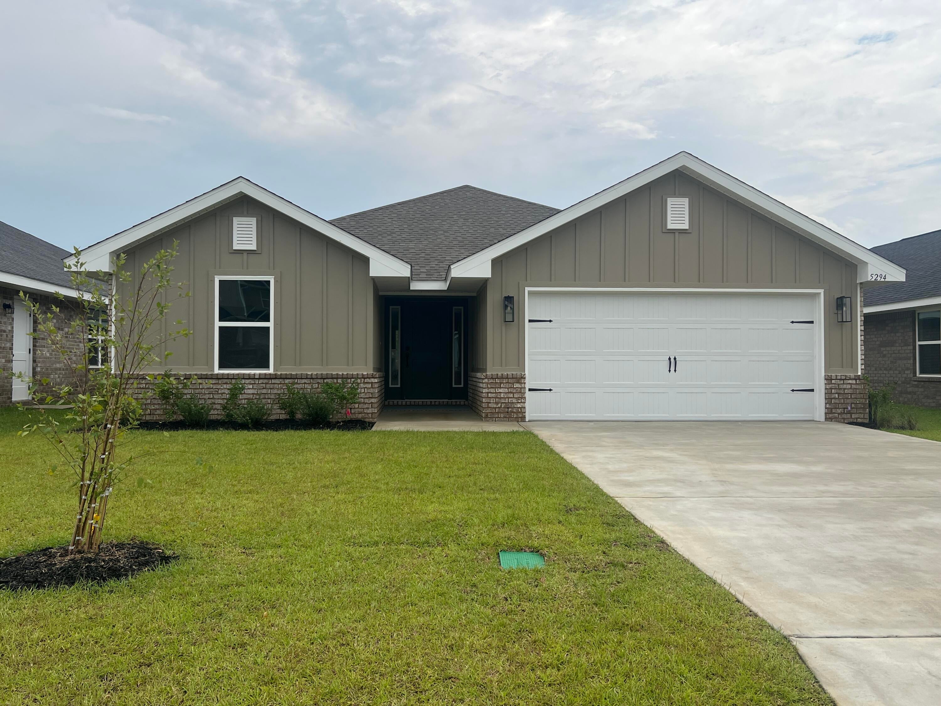 Welcome to HIDDEN PINES by Adams Homes. Located just 30 minutes to Navarre Beach, with close proximity to schools, shopping and much more. This home is 3-sided brick with Hardi design front, 2 car automatic garage, sprinklers with timer, and a sodded yard with a landscaping package. Some upgrades that are being added to this home include granite/quartz countertops in kitchen and bathrooms, Puretec LVP flooring everywhere with carpet only in bedrooms, craftsman style elevation, and garden tub in the master bathroom.