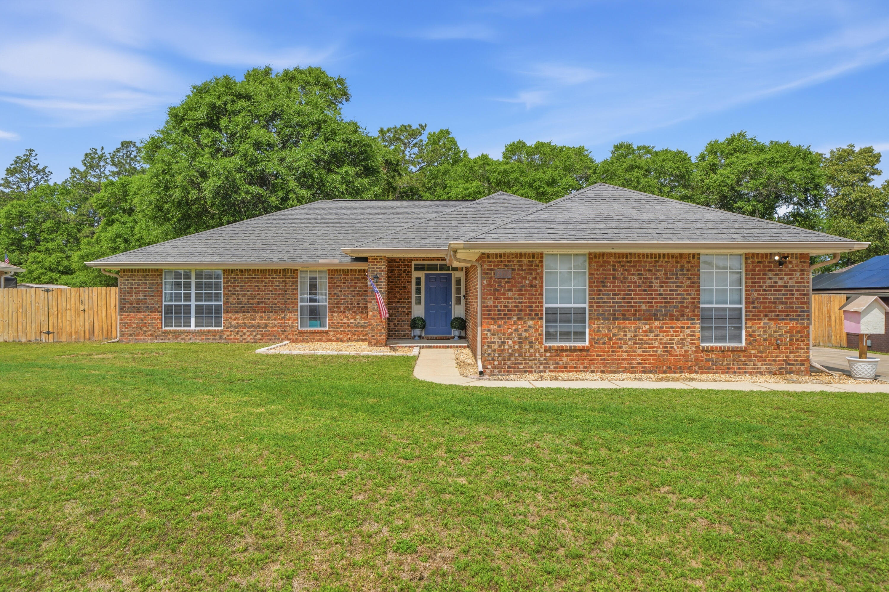 ***2.25% ASSUMABLE VA LOAN!!!*** {NEW ROOF & WATER HEATER BEFORE CLOSING!!} If you're wanting a huge fenced backyard, 4 bedrooms, and updates throughout, then look no further! This beautiful & spacious 4BR/2BA home is nestled on a large half acre lot in the desirable & established community of Silver Creek Estates that features underground utilities! The thoughtful open & split floorplan offers ease for entertainment. Enjoy all the wonderful features for both inside & outside such as high ceilings in the living room, kitchen, & dining area, no carpet, LVP flooring throughout with tile in the bathrooms, quartz kitchen countertops, spacious living room with fireplace, a screened-in back porch, outdoor fire pit area, gutters, a sprinkler system, and SO much more!! This home is a MUST SEE! Septic tank is located in front yard. It was just pumped & inspected in January 2026. We have 3 insurance quotes:  $1,393 (People's Trust through Cooke Insurance Agency - Niceville), $1,740.97 (Frontline through Cooke Insurance Agency - Niceville), and $1,753 (Cypress through Affordable Home Insurance).