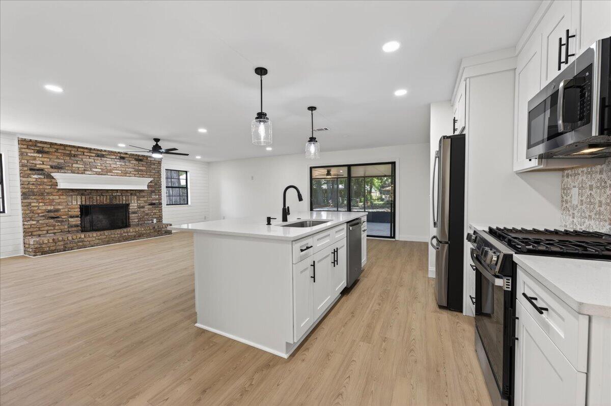 Welcome to 1467 Live Oak Street, a beautifully reimagined 5-bedroom, 3-bathroom home with a dedicated office and 2,921 square feet of stylish, updated living space sitting on 0.43 acres in the heart of Niceville.
This comprehensive renovation left nothing untouched -- all new plumbing, electrical, kitchens, and bathrooms were completed throughout the entire home. The stunning kitchen impresses with white shaker cabinets, soft-close drawers, quartz countertops, and stainless steel appliances. A large pantry, spacious breakfast bar, and multiple storage closets keep everything organized and within reach. A separate formal dining room rounds out the perfect entertaining space.
Major systems have all been updated for worry-free living -- the roof, dual HVAC units were all replaced in 2017. The tankless water heater was just replaced in 2026 with all of the plumbing being upgraged to pex piping. 
 A brand new driveway, fresh irrigation system, and new sod and landscaping deliver outstanding curb appeal from the moment you arrive.
Step outside to a generous 26x20 screened back porch, perfect for relaxing and entertaining year-round. Car enthusiasts and hobbyists will appreciate the 25x22 metal garage plus an additional 15x24 concrete slab, ready for a second garage, workshop, or extra storage. With nearly half an acre of land, there is plenty of space for your RV, boat, and multiple vehicles.
This exceptional property delivers space, quality, and upgrades throughout --