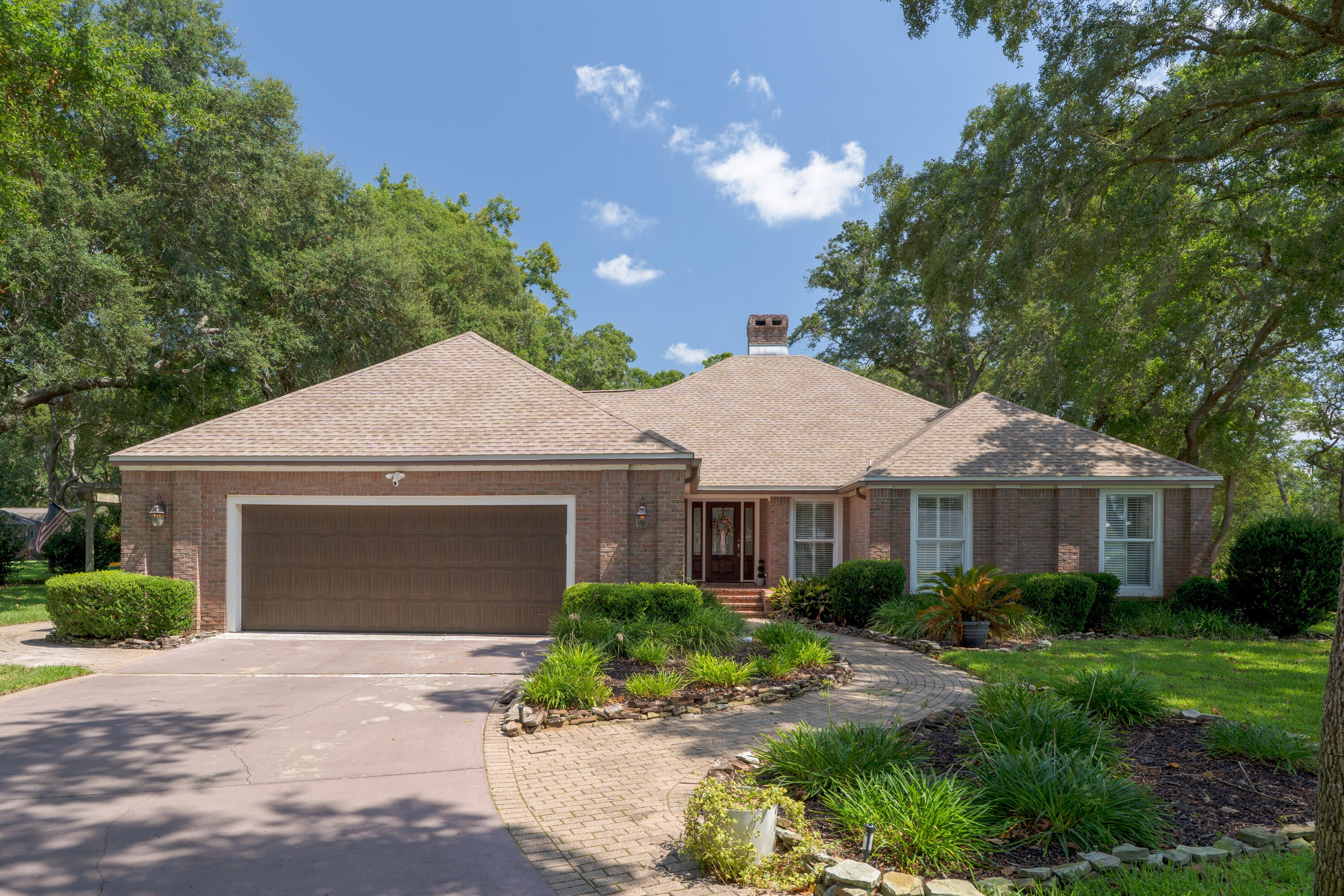 Set on a private one acre parcel, this pool home in Lake Pippin Estates has it all. The long driveway and extra parking winds through beautiful live oak trees. A true outdoor entertainment estate with a caged gunnite pool and patio plus a pergola side patio off of a large gorgeous Florida room.  The kitchen features granite countertops, lighted display cabinets, and a Subzero fridge. The primary suite has updated bathroom with a large walk in shower with duel shower heads. The main living room overlooks the pool and has a brand new custom entertainment center. The fireplace serves as the heart of the home enjoyed both from the living room and the entryway. The light filled Florida room is flanked by casement windows all around. Lake Pippin has a neighborhood park with 170' sandy beachfront just down the street. A short drive to Destin and all the entertainment and shopping across the bridge.