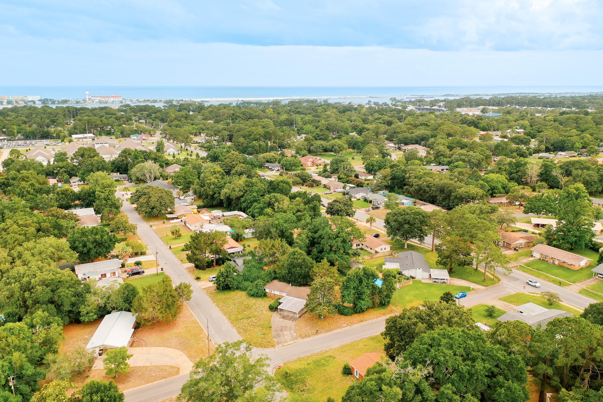 Conveniently located just minutes from the beautiful beaches of Okaloosa Island and the shopping, dining, and entertainment of downtown Fort Walton Beach, this property offers a great opportunity for investors, renovators, or buyers looking to make a home their own. Being sold AS IS, the home features a spacious driveway, covered carport, and mature landscaping that adds character and curb appeal.

The backyard includes a detached workshop, perfect for hobbies, storage, or additional workspace. With a desirable location and plenty of potential, this property is ready for its next chapter.