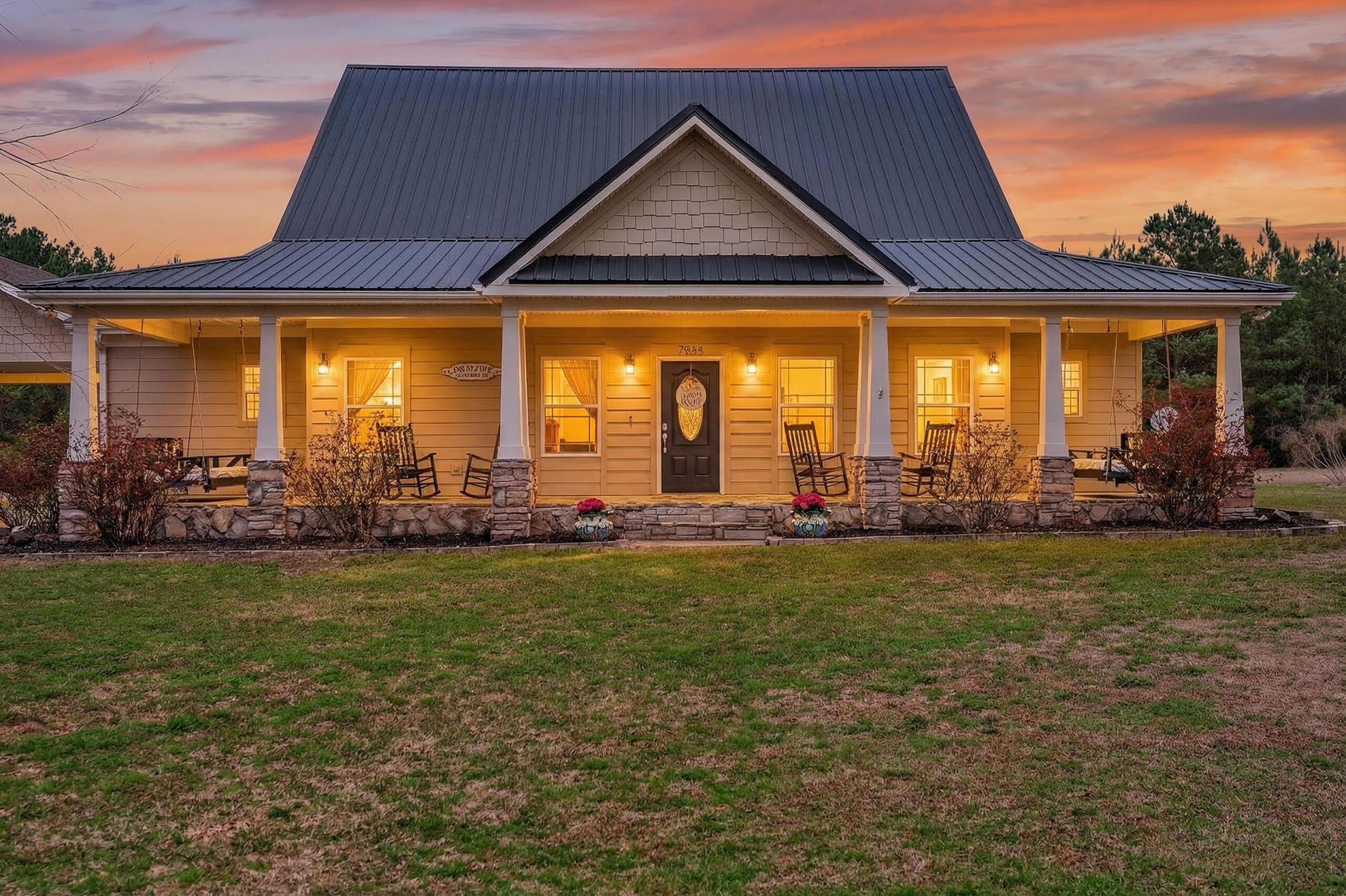 Luxury country living!! Easy commute to beaches, bases and shopping centers. This home has 4 bedrooms, 2 bathrooms, over 2800 sqft of living space, under a metal roof with 10 acres.  One car garage/shop with covered oversized car port that also has a 30amp power hookup. Inside the home you will see, hand scraped 3/4'' solid oak floors in the living room, dining room, hallway and foyer. Primary bedroom has 2 walk-in closets, large walk-in shower with dual shower heads.  Custom cabinets throughout home with 12'' inch crown molding.  The kitchen has a huge island with an exquisite stone wall.  Outside is a LARGE wooden deck.  Custom free form gunite pool with tanning ledge, extended pool decking and gazebo (w/ electric)