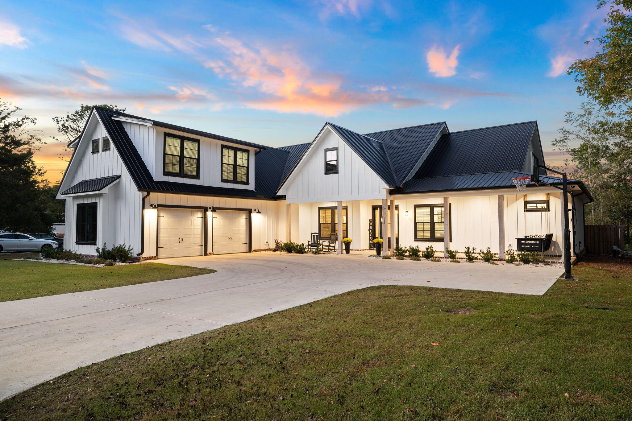 Welcome to this stunning custom-built waterfront home, where modern luxury meets effortless coastal living. Located just outside the Freeport city limits and only a 10-minute drive to 30A and the beautiful beaches of South Walton, this home offers the perfect balance of privacy and convenience. Featuring 4 bedrooms plus a bunk room and office, 3 full and 2 half baths, and a spacious 2-car garage, this thoughtfully designed residence blends elegance, comfort, and functionality at every turn. Inside, you'll find a bright open concept layout with vaulted ceilings, durable LVP flooring, and custom woodwork throughout. The inviting living area is anchored by a gas fireplace with built-in cabinetry, creating the perfect space for relaxing or entertaining. A gourmet kitchen is a true showpiece, featuring premium Thermador appliances including a 6-burner gas range, a built-in, professional-grade refrigerator, quartz countertops, a built-in microwave drawer, wine fridge, abundant cabinetry, and a large walk-in pantry, designed to impress even the most discerning chef! A split bedroom floor plan provides privacy, with the luxurious primary suite tucked away on one side of the home, while two guest bedrooms occupy the opposite wing. Upstairs, you'll find an additional guest suite with a full en-suite bath, along with an oversized bunk room complete with 2 sets of built in FULL SIZE bunks. Step outside and experience true waterfront living. Cont... Situated along the peaceful waters of Mallet Bayou with direct access to Choctawhatchee Bay, this property is a boater's dream. The private dock and boathouse make getting on the water effortless, and the dredged frontage allows for larger vessels (4'-5' in the center). Whether it's fishing, paddleboarding, or cruising the bay, adventure awaits just steps from your backyard. *Additional Features* include a 22kW whole-home generator connected to propane for peace of mind, as well as a 50-amp outlet ideal for an electric vehicle or motorhome. Furnishings are negotiable, offering a turnkey opportunity if desired. This exceptional property offers the perfect blend of luxury, tranquility, and outdoor lifestyle. Wake up to breathtaking water views, enjoy your morning coffee on the dock, and embrace the very best of coastal living. Don't miss your opportunity to own this waterfront oasis.  An additional .55 Acres is available next door at 92 Waterside Lane.