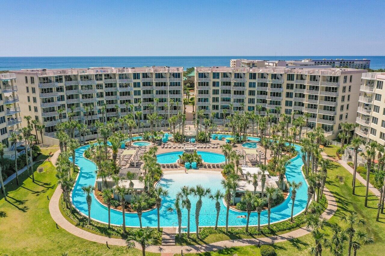 Welcome to Sandpiper L01 at Destin West Beach & Bay Resort, a beautifully updated ground-floor condo offering the perfect blend of comfort, convenience, and resort-style living. This spacious 1-bedroom condo with a bunk area and 2 full baths is located on the highly desirable lanai level, allowing you to step directly from your private patio to the pool deck and the resort's famous 700-foot lazy river.

One feature that truly sets this unit apart is the abundance of natural light. Unlike many condominium units, this condo has windows that fill the living space with sunlight, creating a bright, open coastal feel throughout.

The floor plan comfortably accommodates family and guests with a spacious primary bedroom, hallway bunk area, sleeper sofa, and two full bathrooms. The kitchen features granite countertops, upgraded appliances, and everything you need whether you're preparing dinner after a day at the beach or entertaining guests.

Another rare feature is the private parking garage, which conveys with the property and provides secure parking and storage with direct access to the unit. It's an amenity that's hard to find in beachfront condos.

Relax on your private lanai with plenty of room for outdoor seating while watching family and friends float by on the lazy river just steps from your patio. From the moment you arrive, you'll appreciate the easy access to everything the resort has to offer.

Destin West Beach & Bay Resort offers exceptional amenities including private Gulf beach access, a 700-foot lazy river, multiple heated pools, hot tubs, a children's splash area, fitness center, marina and bay access, grilling areas, and beautifully maintained tropical landscaping.

Located just minutes from the Gulfarium, Okaloosa Island Fishing Pier, The Boardwalk, restaurants, shopping, and entertainment, this property is ideal as a second home, primary residence, or income-producing vacation rental. Whether you're looking for your own beach getaway or your next investment property, Sandpiper L01 offers an exceptional opportunity in one of the Emerald Coast's most sought-after resorts.