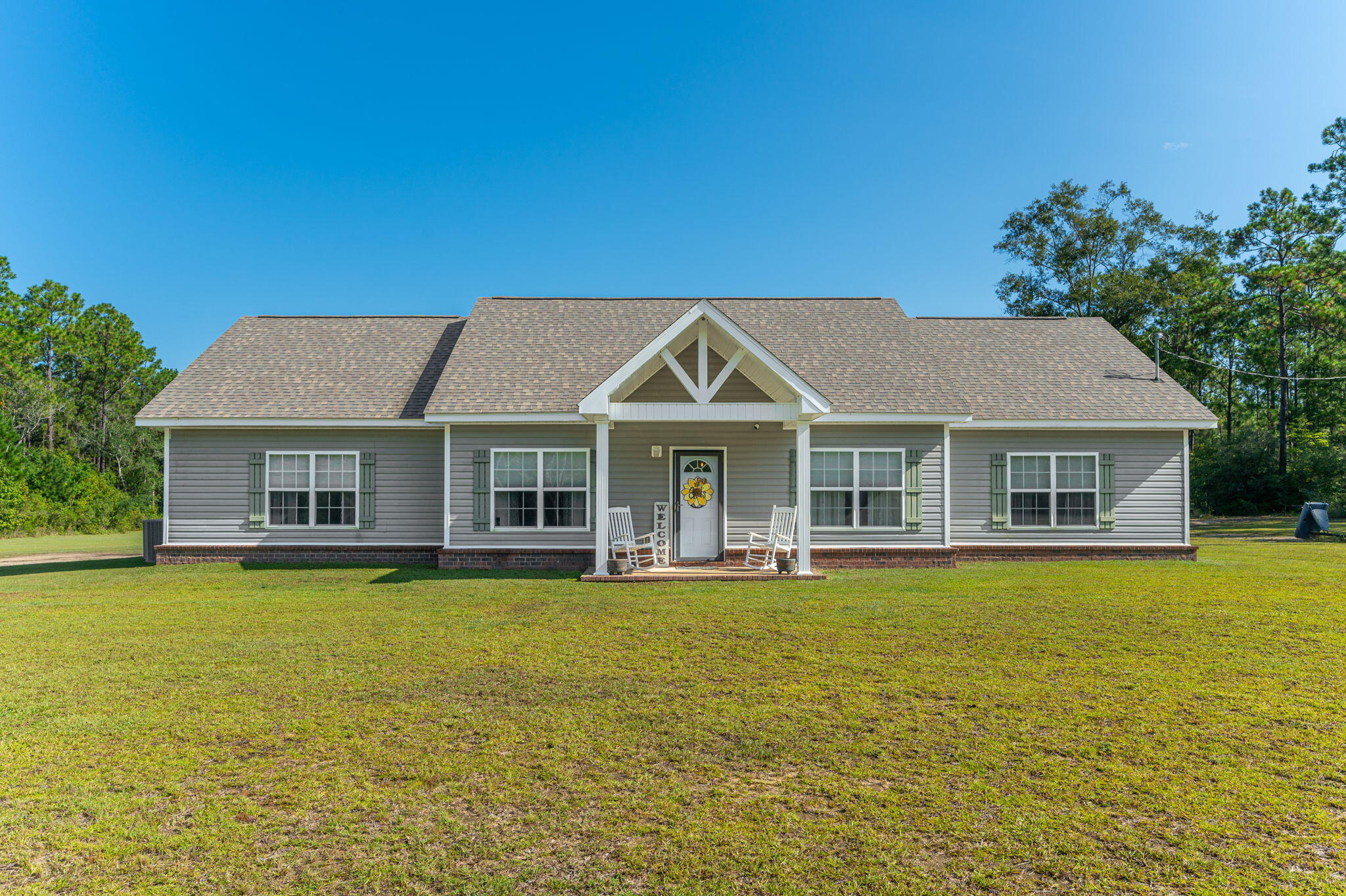 Welcome to 3005 Pipkin Rd, Bonifay, FL -- where comfortable country living meets modern style! Built in 2018, this beautiful Craftsman-style home offers 4 bedrooms, 2 bathrooms, and 5 spacious acres, giving you plenty of room to enjoy privacy, outdoor living, and all the possibilities that come with acreage.

Step inside to an inviting open-concept floor plan featuring a spacious kitchen with stainless steel appliances, ample cabinetry, and plenty of room for gathering with family and friends. The open kitchen and living areas create a warm, welcoming space for both everyday living and entertaining.

The primary suite offers a relaxing retreat with a separate shower and soaking tub, along with a generous walk-in closet. Three additional bedrooms provide plenty of space for family, guests, an office, or hobbies.

Outside, the possibilities are endless! The 5-acre property includes a nice pole barn, offering valuable space for storage, equipment, hobbies, or outdoor projects. With so much room to spread out, there's even plenty of space to add a pool and create your own backyard oasis.

If you're looking for a newer home with acreage, a functional layout, and room to make the property your own, this Bonifay property is a must-see!