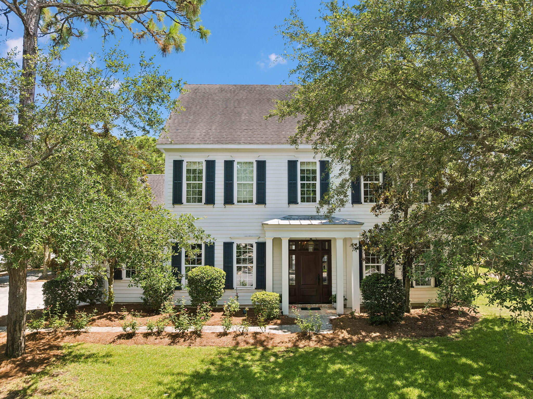 Under contract with a 72-hour kick-out clause. Beautiful custom home located in the gated waterfront community of Botany Bayou, offering privacy, timeless architecture, and an exceptional Santa Rosa Beach location just minutes from 30A, Grand Boulevard, Sacred Heart Hospital, and Choctawhatchee Bay. Backing to a protected wooded preserve, this home features soaring ceilings, extensive millwork, abundant natural light, and spacious living areas designed for everyday comfort and entertaining. The gourmet kitchen opens seamlessly to the great room, while the luxurious primary suite offers a spa-like bath with dual vanities, soaking tub, walk-in shower, and generous closet space. Upstairs you'll find spacious guest bedrooms, beautifully appointed baths, and flexible bonus space ideal for a media room, office, or playroom. Enjoy peaceful outdoor living with a private courtyard and covered entertaining spaces surrounded by mature trees. Botany Bayou residents enjoy a community pool, dock, bay access, and the security of a gated neighborhood--all just minutes from the area's renowned beaches, restaurants, and shopping.