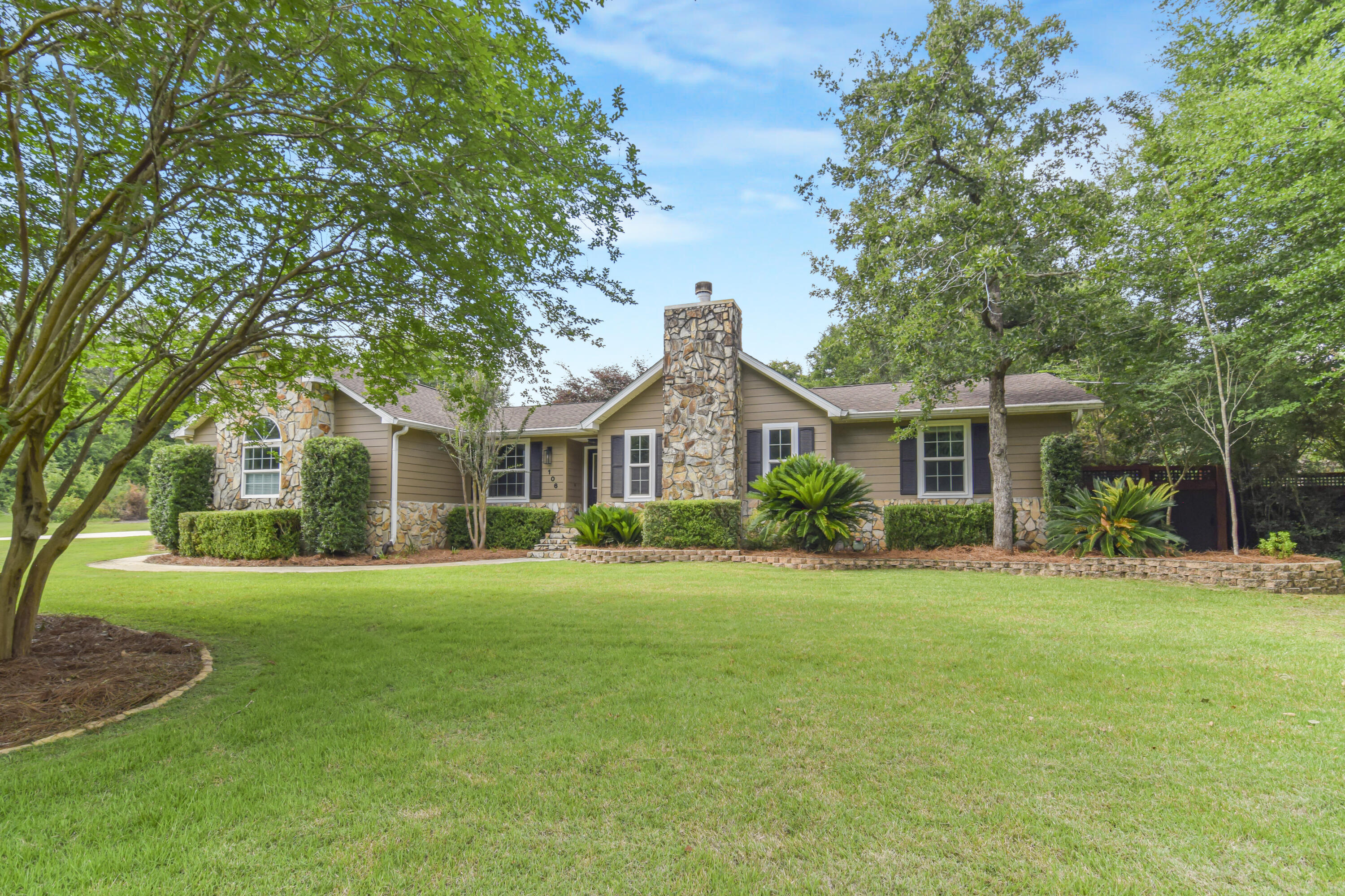 Luxury, privacy, and resort-style living define this stunning executive home on 1.16 acres. This beautifully appointed 3-bedroom, 2.5 bath residence with a 2-car garage offers elegance and comfort throughout. Vaulted ceilings, custom built-ins, and a striking stone fireplace highlight the main living area. The gourmet kitchen features all-wood cabinetry, stainless steel appliances, a gas range, and illuminated quartz countertops. Outside, enjoy your private backyard oasis with a sparkling pool, hot tub, koi pond, and expansive 12x24 covered porch--perfect for entertaining or relaxing. A new roof was installed in April 2026. Combining luxury, acreage, and exceptional outdoor amenities, this property offers a peaceful retreat with convenient access to shopping, dining, and everyday essentials