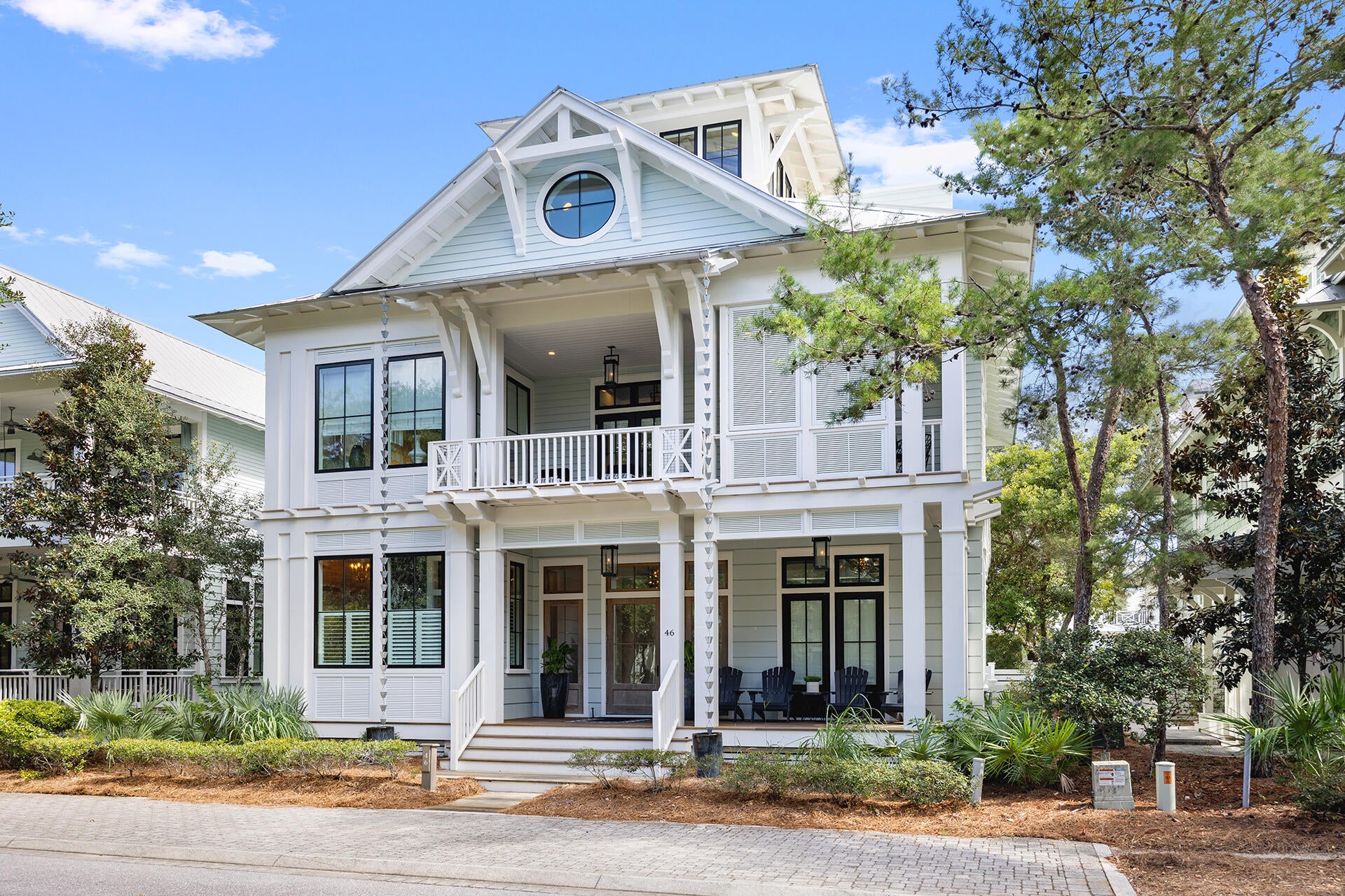 Welcome to 46 Mistflower Lane, an exceptional custom residence in the heart of WaterColor Phase 3 where timeless coastal architecture, sophisticated interiors and an extraordinary array of indoor and outdoor living spaces come together to create a truly distinctive 30A retreat. This 'Never-Rented' and 'Lightly Lived-In' second home was designed by acclaimed architect T.S. Adams and constructed by Borges-Brooks, this approximately 5,198-square-foot home offers five bedrooms, five full and two half baths, thoughtfully arranged across multiple levels for both gracious entertaining and relaxed coastal living. From the moment you enter, the quality of craftsmanship is unmistakable. Reclaimed oak flooring, custom cabinetry, beautifully detailed ceilings and carefully selected stone, tile and fixtures create interiors that feel refined yet comfortable. The main level centers around expansive living and dining spaces and a beautifully appointed kitchen complemented by a generous butler's pantry. A dramatic wall of glass opens the living area to the covered outdoor entertaining space, seamlessly connecting the interior with the home's private pool, outdoor kitchen and gathering areas. The second level is dedicated primarily to bedroom accommodations, including a spacious primary suite with its own sitting area and private covered porch. The luxurious primary bath combines custom oak cabinetry, marble surfaces, artisan tile and a generous walk-in closet. 
 A second suite offers soaring ceilings and its own wet bar, while two additional guest bedrooms provide comfortable accommodations for family and friends.
Designed with entertaining in mind, the third floor becomes its own retreat with multiple television and lounge areas, a game space, built-in bookcases and a bunk room with adjoining bath. An elevator serves the first three levels, while a custom staircase continues to the fourth-floor sunroom and observation deck, offering panoramic views across WaterColor and an unforgettable setting to enjoy the coastal surroundings.
Outside, the private pool, covered porches, summer kitchen, outdoor fireplace and multiple gathering spaces create an inviting extension of the home and a setting equally suited to quiet mornings, afternoon swims or evenings entertaining friends and family. An attached two-car garage adds a particularly desirable convenience within the community.
Located within one of Scenic Highway 30A's most sought-after communities, 46 Mistflower Lane offers access to the celebrated WaterColor lifestyle, including community pools, beach access, tennis, recreation areas, parks and miles of paths connecting residents to the beach and neighboring Seaside.
46 Mistflower Lane is more than a coastal residence--it is a beautifully executed WaterColor home designed for generations of memories along 30A.
