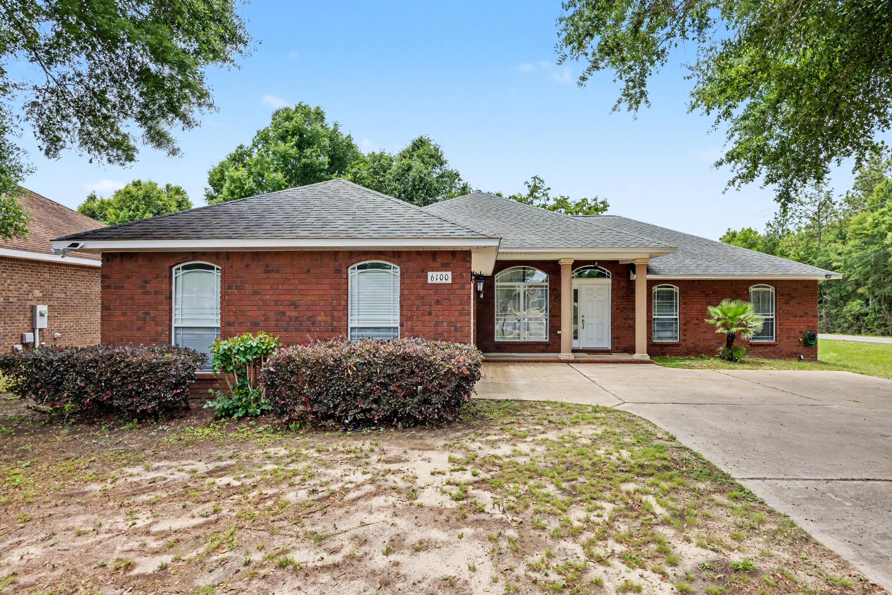Situated on a spacious corner lot, this beautifully cared-for home stands out with timeless design, thoughtful details, and a layout that feels both refined and functional. A long driveway and inviting front porch create a welcoming first impression, while the side-entry garage adds to the home's clean curb appeal.

Inside, you'll find tall ceilings, elegant living spaces, and a floor plan that offers more character and separation than many newer homes built today. The kitchen features granite countertops, solid wood cabinetry, ample prep space, and a cozy breakfast nook perfect for everyday dining. A separate formal dining room provides additional space for gatherings and entertaining.

One of the secondary bedrooms includes glass doors, making it an ideal option for a home office, study, or flex room. The spacious primary suite offers a relaxing retreat with both a soaking tub and separate shower.

Step outside to enjoy the fully fenced backyard with a newer fence and plenty of room to unwind, entertain, or let pets play freely. Conveniently located in Crestview with no HOA, this home combines charm, space, and functionality in a setting that truly feels established and welcoming.
