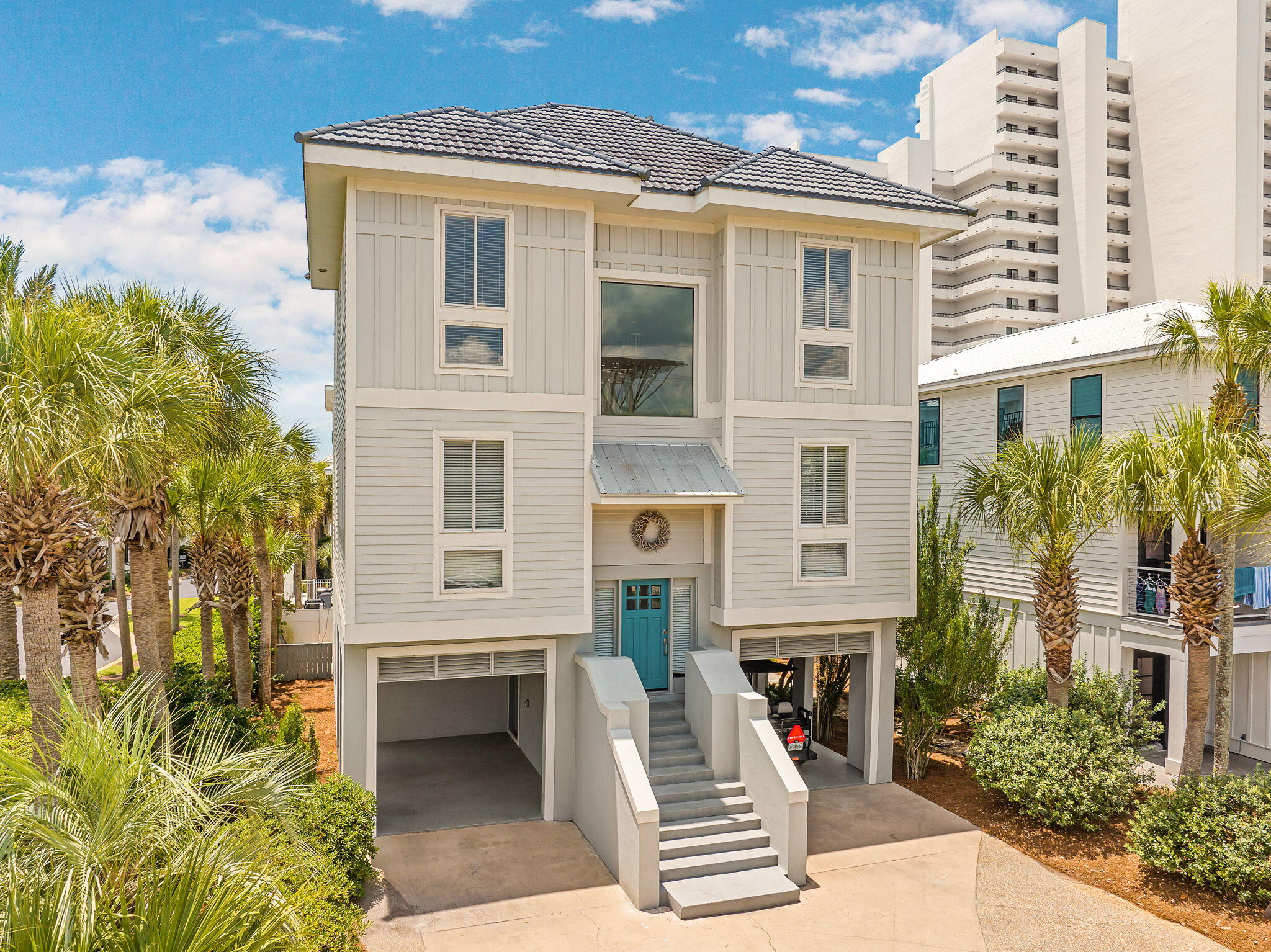 This is not just a home on 30A, it is a statement. Perfectly positioned on the coveted south side of Scenic Highway 30A, 4132 E Co Hwy 30A delivers the kind of grand coastal living that buyers dream about and rarely find. Steps from the sugar white sands and emerald waters of the Gulf, this stunning four story beach house sits inside The Cliffs at Seagrove, an exclusive six lot enclave with deeded beach access and a private dune walkover. Translation: the beach is not a drive away, it is a walk away Built in 1997 and offering four impressive levels, this five bedroom, four bath home was designed to impress and built to perform. The first floor offers a private lock out suite with its own bedroom, full bath, kitchen, and living area, perfect for guests, multigenerational living, or serious rental income potential. Head upstairs to the second floor, where two additional bedrooms, a full bath, a spacious great room, and a chef quality kitchen create the ultimate space for entertaining. The third floor is dedicated entirely to an oversized master retreat with a spa like bath, separate shower, and garden tub, because after a day on 30A, you deserve a little luxury. A spiral staircase leads up to a one of a kind fourth floor loft with additional bedroom space, the kind of feature that makes an offer memorable.

Outside, the lifestyle continues with expansive porches on every level and a private outdoor spa made for stargazing, sunset toasts, and salt air evenings. This is more than a listing. It is a rare opportunity to own one of the most distinctive properties on 30A, in a location this good and a subdivision this exclusive. Homes like this do not come around often, and they do not last long. Welcome to 4132 E Co Hwy 30A.