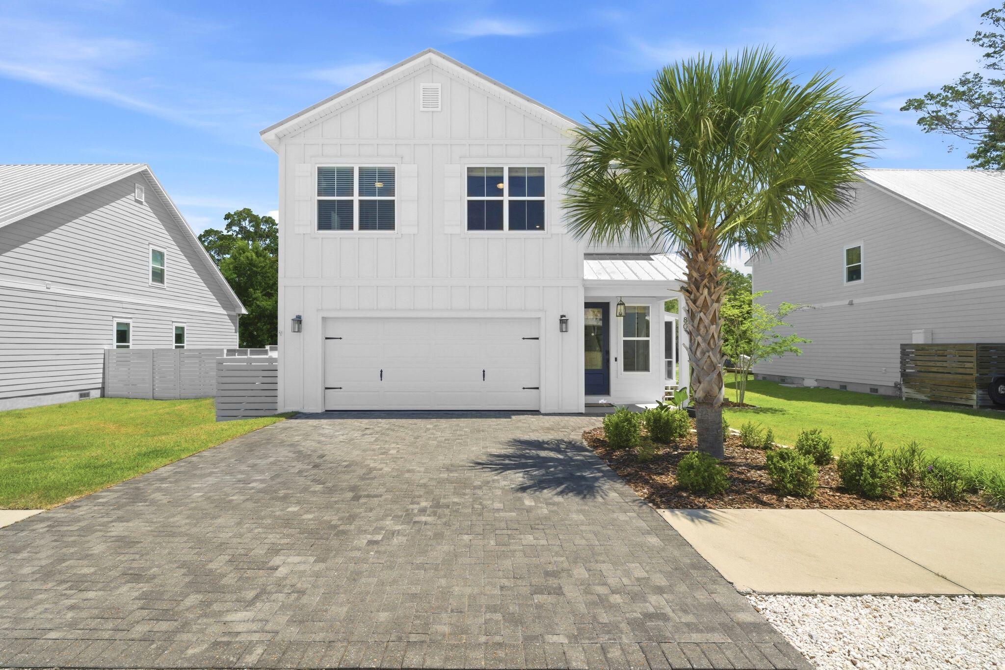 80 Bayou Edge Landing is the kind of Santa Rosa Beach home that makes everyday living feel easy. Built in 2021, this 4-bedroom Key Largo plan sits in Daxton on the Bay, an intimate bayou-side community just minutes from the beach, Destin, 30A, dining, shopping, and boat-day logistics.

Inside, the home feels fresh and welcoming with 9-foot ceilings, fresh interior paint, Craftsman-style details, upgraded lighting, designer window treatments, and board-and-batten accents. The kitchen balances style and function with quartz countertops, gas cooking, upgraded cabinetry, pullout drawers, vertical tray storage, and thoughtful pantry organization. Smart-home features include a Ring doorbell, Ecobee thermostat, smart lighting controls, connected home integration, and Wi-Fi-enabled garage door access. Just beyond the main living area, the newly screened porch creates a seamless transition to outdoor living and offers a comfortable place to relax year-round. A tankless gas water heater adds everyday efficiency.

With four spacious bedrooms and elevated bathroom finishes, the home is well suited for full-time living, a second home, or a low-maintenance coastal retreat.

Daxton on the Bay is one of Santa Rosa Beach's best-kept secrets. With just 31 homes, private bayou access, a community pool, and a peaceful setting, it offers a refreshing alternative to the busier beachside neighborhoods while keeping everything that matters within easy reach. Beach access close by. Bayou access at home. That is a strong combination.