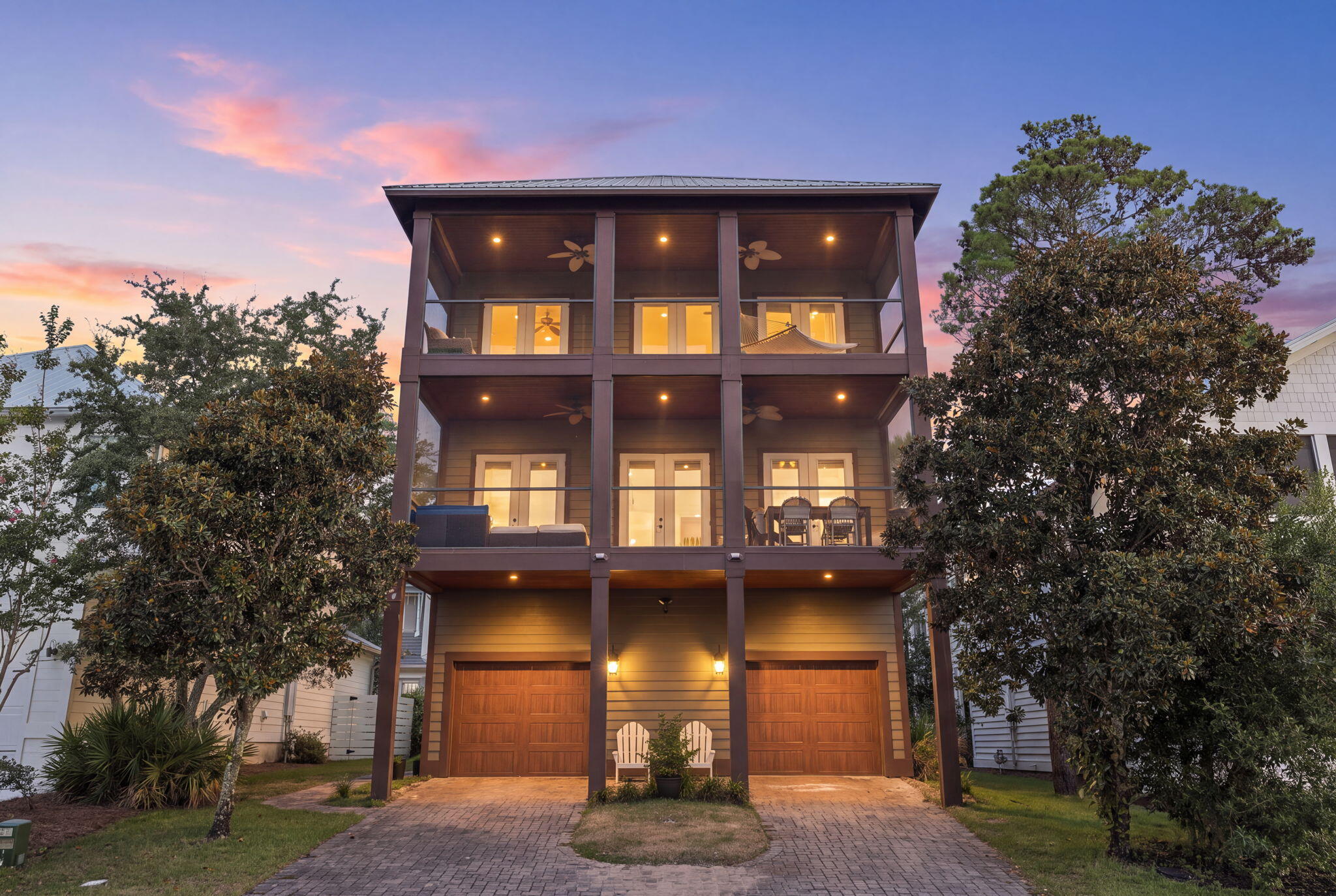 There's something about Grande Pointe that feels removed from the pace of 30A, even though so much of it is right outside the neighborhood. Set between Lake Powell and protected state land, this Inlet Beach community puts you within walking distance of 30Avenue, Rosemary Beach, and public beach access, while giving you a quieter place to come home to.

Spanning three stories and 2,646 square feet, this 4-bedroom, 3.5-bath home was designed with outdoor living woven into every level. Large front and rear balconies create space to slow down, catch the breeze, and enjoy the wooded surroundings. Screened balconies add even more usable outdoor space, while abundant natural light carries throughout the home. Inside, the details have substance: hand-scraped maple flooring, custom KraftMaid cabinetry, travertine baths, crown molding, wainscoting, tiled front porches with stained tongue-and-groove ceilings, and rear porches finished in Cumaru hardwood.

The ground-floor bedroom has a private exterior entrance, creating flexibility for guests or potential rental use. A large garage accommodates two vehicles with additional room for a golf cart, complemented by extra driveway parking.

Grande Pointe sits along Lake Powell and offers a community dock, pool, clubhouse, and nature walk. From here, the beach is an easy walk, Rosemary Beach and 30Avenue are close by, and you can enjoy everything along 30A without having to live directly in the middle of its traffic.

Close to what brings you here. Quiet enough to make you want to stay.

All information is deemed reliable and provided for informational purposes; buyers are encouraged to independently verify all details.