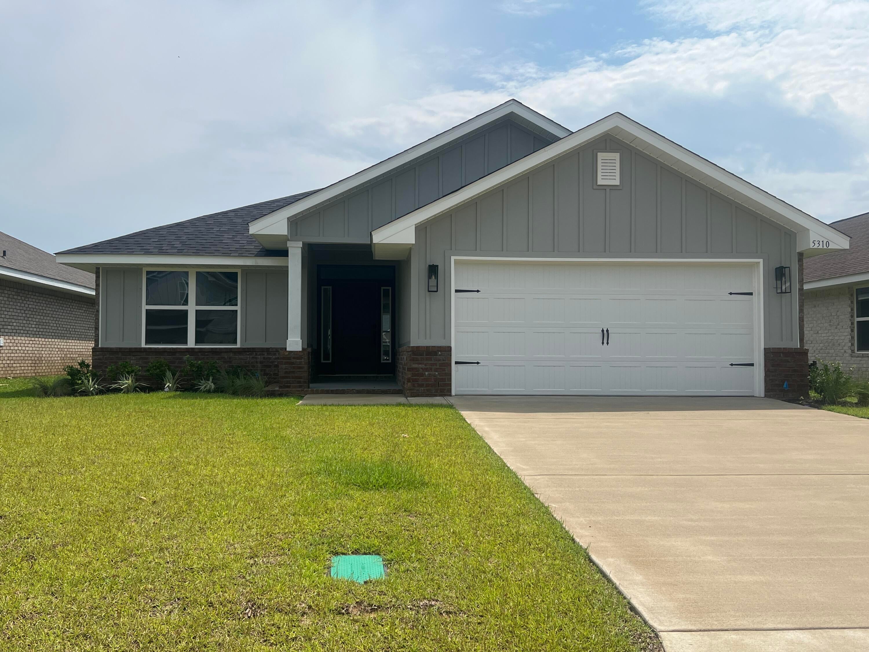 Welcome to HIDDEN PINES by Adams Homes. Located just 30 minutes to Navarre Beach, with close proximity to schools, shopping and much more. This home is 3-sided brick with Hardi design front, 2 car automatic garage, sprinklers with timer, and a sodded yard with a landscaping package. Some upgrades that are being added to this home include granite/quartz countertops in kitchen and bathrooms, Puretec LVP flooring everywhere with carpet only in bedrooms, craftsman style elevation, and a tile shower in the master bathroom.