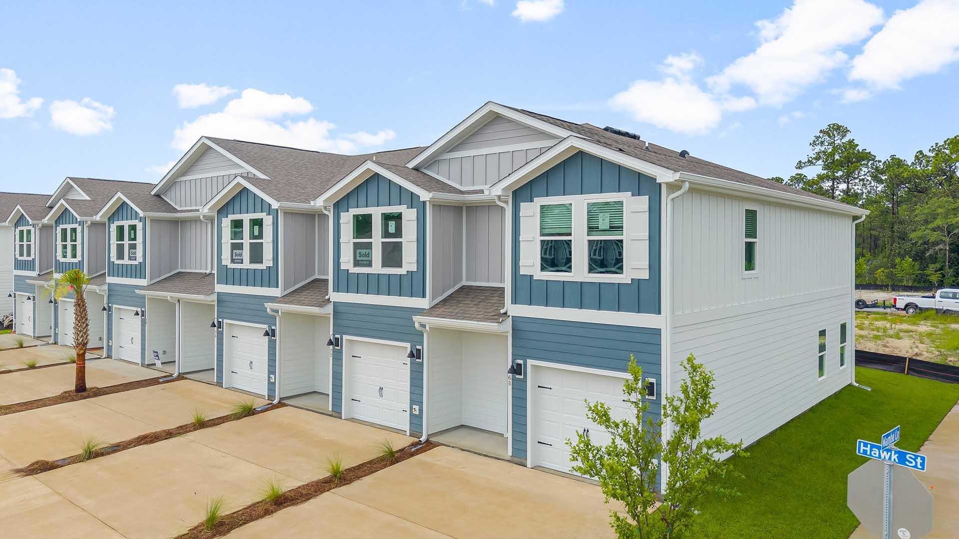This two-story end unit townhome is under construction and has 3 bedrooms, 2.5 bathrooms and is an end unit.  As you enter this home you will find EVP flooring in the foyer leading to the expansive open-concept kitchen, living, and dining area, designed for entertaining and everyday living. The kitchen is open and spacious with a center island. The kitchen features quartz countertops and premium stainless appliances including a smooth top stove, microwave and dishwasher. The living area is well illuminated with exterior windows and a glass door leading to the back patio.