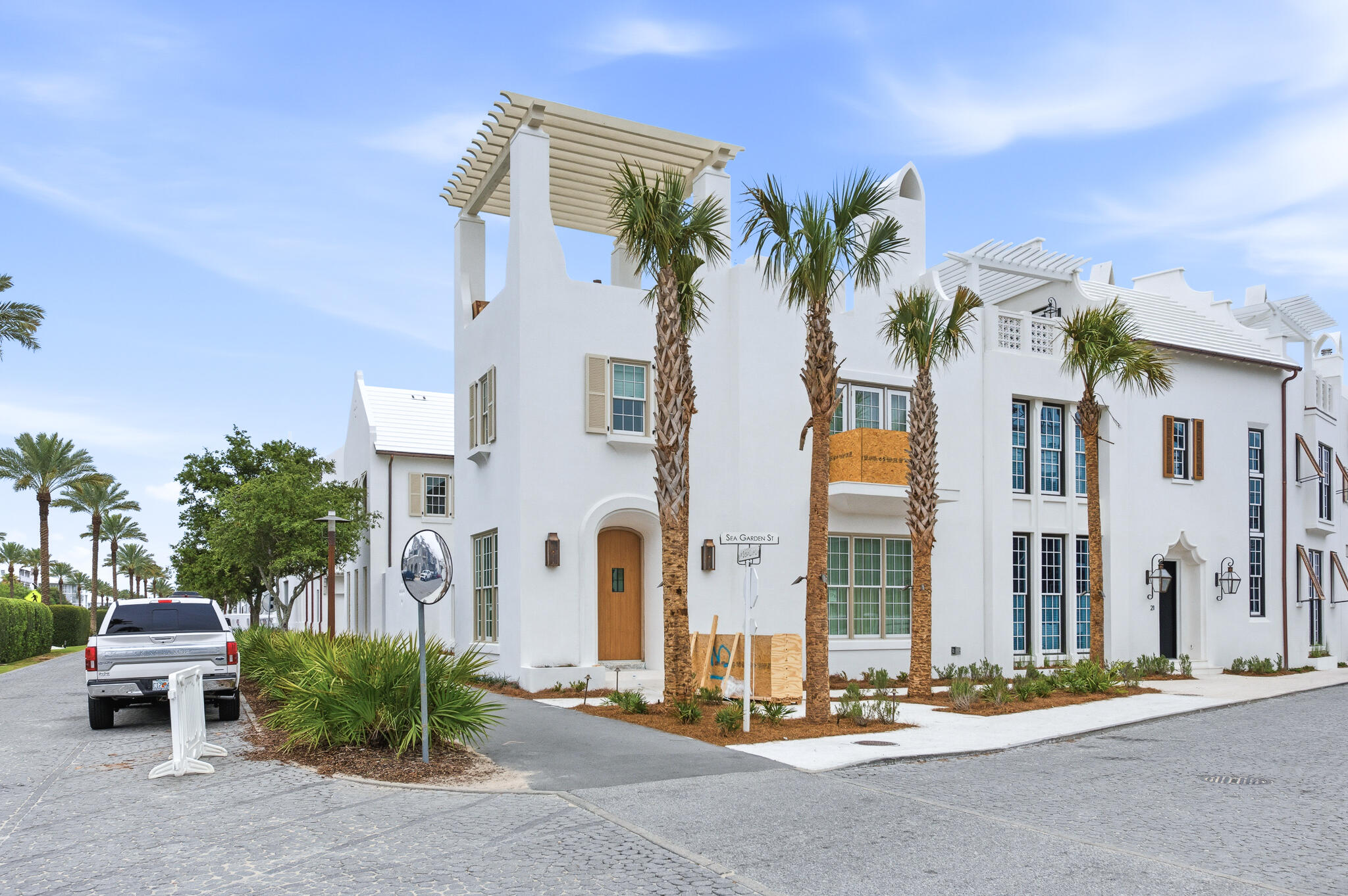 13 Sea Garden Street is a brand-new construction south of 30A home in Alys Beach. Designed by Chancey Architecture, this custom home offers 4 bedrooms, a large bonus room, 5.5 bathrooms, a two-car garage with storage and an elevator up to the 3rd floor rooftop terrace. The private courtyard is designed for entertaining and everyday living with its two sets of bi-folding doors that open out to the plunge pool, covered outdoor living space, sunning area, and summer kitchen. The 3rd floor rooftop terrace looks west to enjoy sunset views over the rooftops of Alys Beach the iconic medjool palms that Alys is known for. 

From the marble mosaic flooring to the Christiana white oak cabinetry and venetian plastered ceilings with lime washed beams, upgraded finishes and fixtures are found throughout. Furnishings and art by Chancey Interior Design convey with the home and add the right touch of coastal elegance.