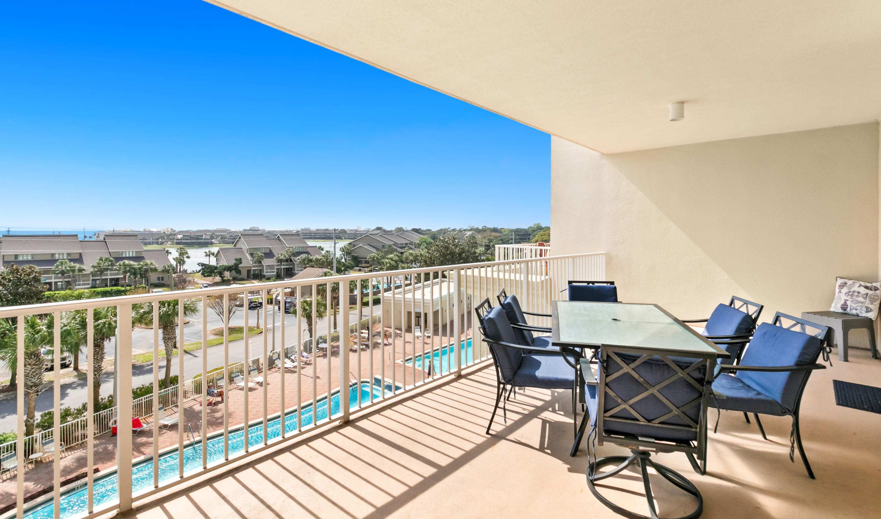 Lowest-priced two bedroom currently available at Ariel Dunes II. This 1,175 square foot, two bedroom, two bath fourth floor unit offers Gulf views from the balcony and sits inside the Seascape resort footprint with access to pools, golf, tennis, dining, and beach service. The unit is dated and priced for it, which is the opportunity. At $399,000 the basis works for an owner who would rather update finishes to their own taste than pay for someone else's renovation, and for an investor who wants the lowest cost entry into a proven rental building. Currently on an on-site rental program and able to transition to the management company of the buyer's choosing. Annual cost to own runs approximately $18,300 including both assessments, taxes, insurance, and electric. Rental history, association documents, and management program options available on request.
The primary suite includes an ensuite bath with soaking tub, separate shower, and dual vanity. The guest bedroom is positioned toward the front of the unit with an adjacent bath, giving both bedrooms real separation for guests or rental groups. Granite countertops, stainless appliances, a full-size laundry room, and a private hallway storage unit complete the interior.